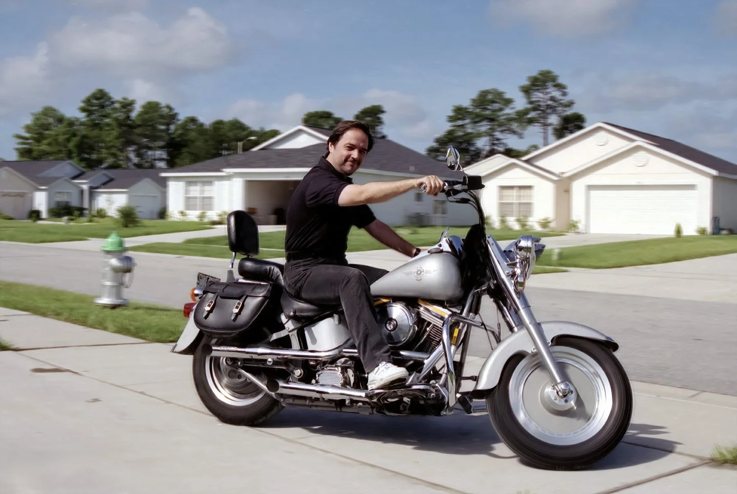 Riding John Beatty's Harley Davidson Fat Boy at his Orlando home.