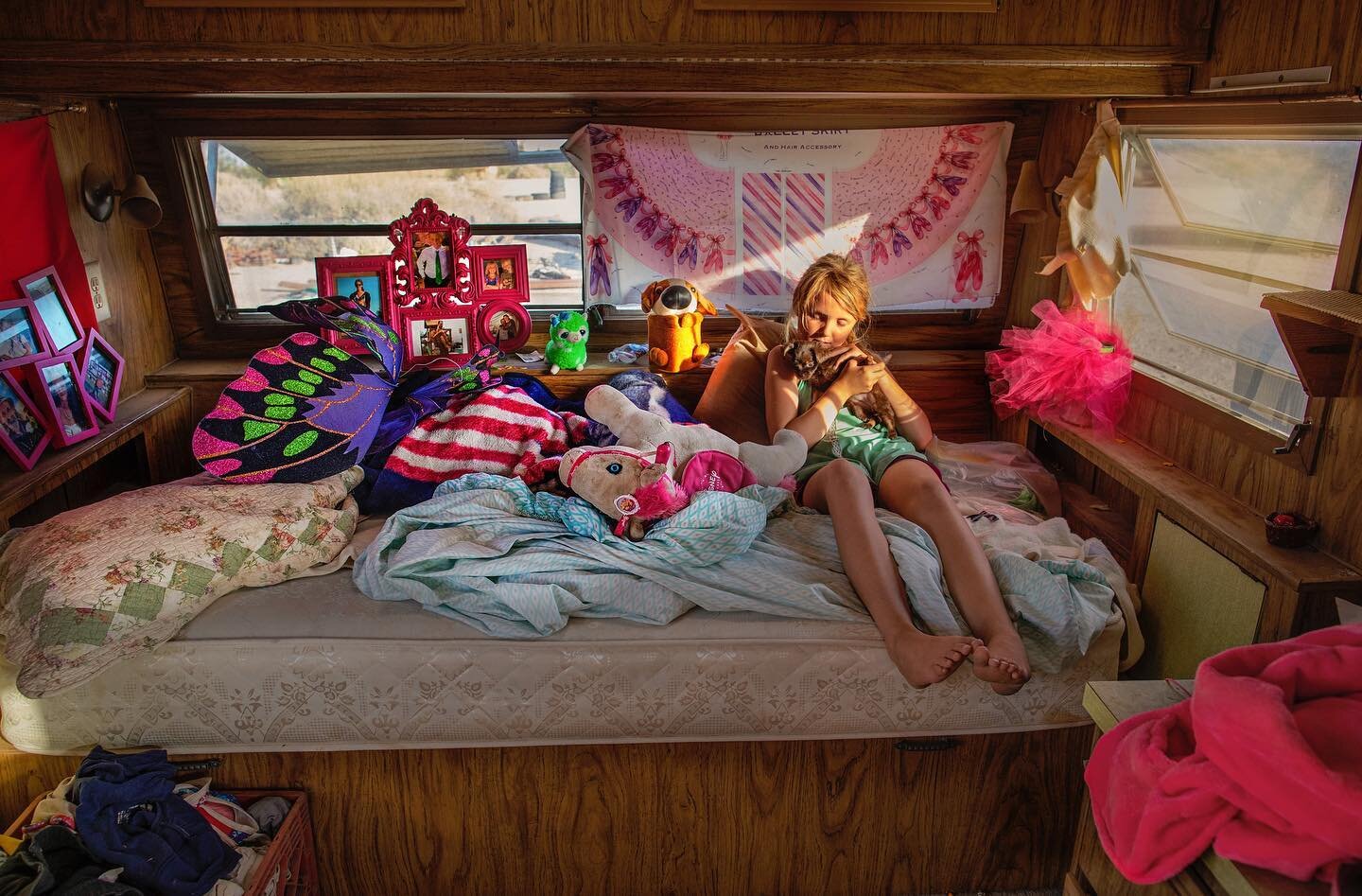 American Bedroom - Kasey age 7 &lsquo;My bedroom is a trailer. I sleep here with my puppy, only not when it&rsquo;s too hot.&rsquo; Slab City, California #americanbedroom  #childhood  #slabcity  #slabcitycalifornia  #lifeinslabcity  #photography  #yo