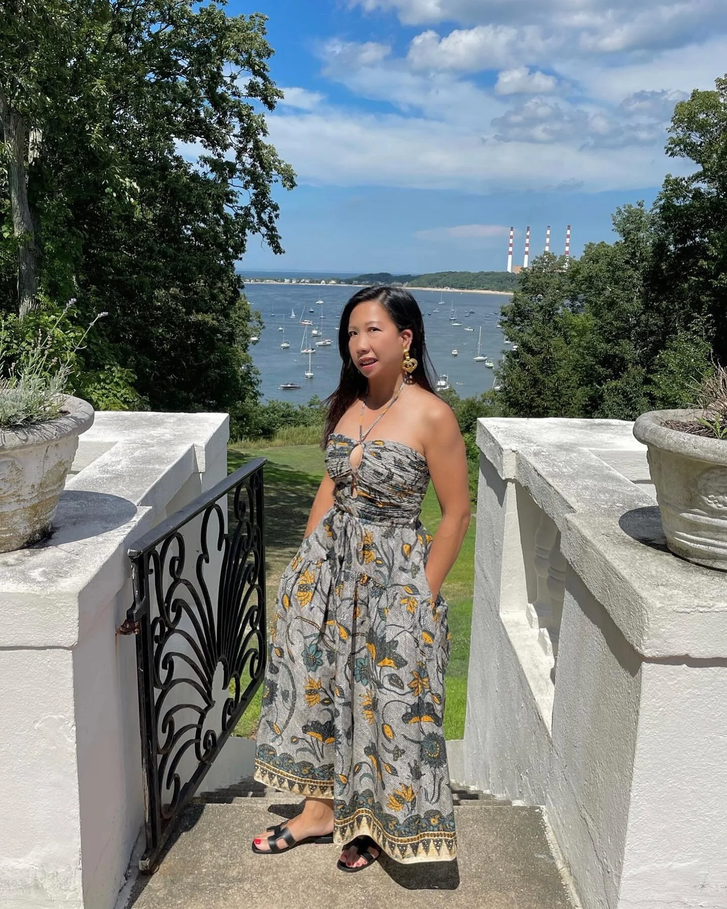 Hey there friends and fam, I&rsquo;m so grateful for you.❤️🤟 
.
.
.
Ulla Johnson dress: @karenzambos @covetbychristos 
Vintage Chanel earrings: @luxurypromise 
Herm&egrave;s Oran sandals: @hermes 
.
.
ID: Donna is standing outside at the top of a  s