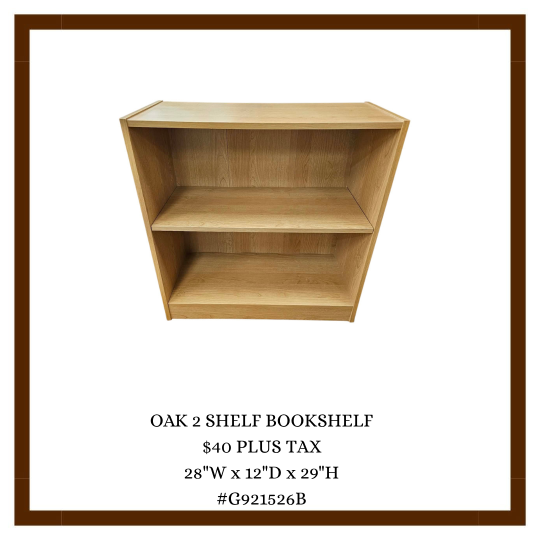 Wooden oak bookshelf with two shelves, measuring 28 inches wide, 12 inches deep, and 29 inches high, with price and product information displayed below.