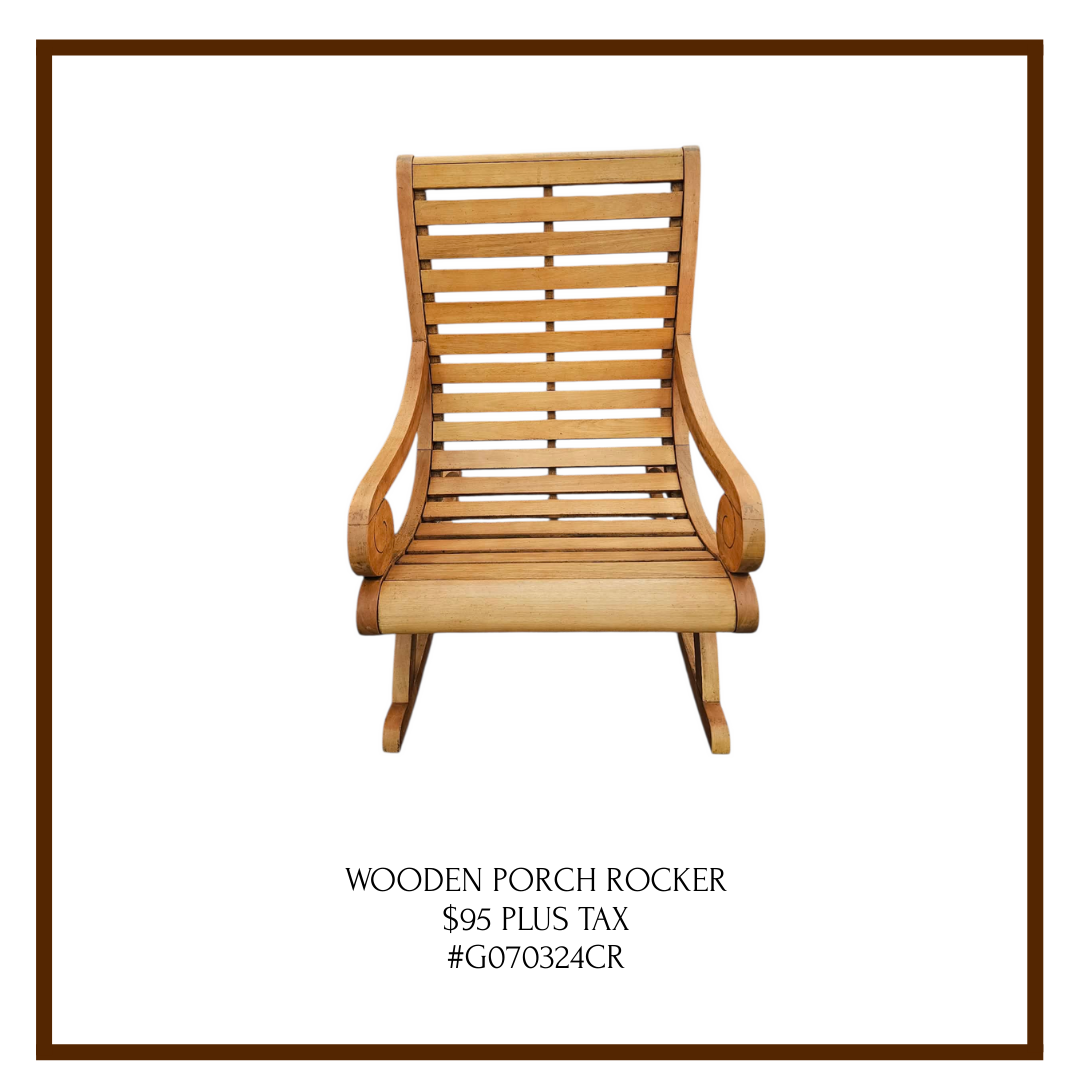 Wooden porch rocker chair with slats and curved armrests