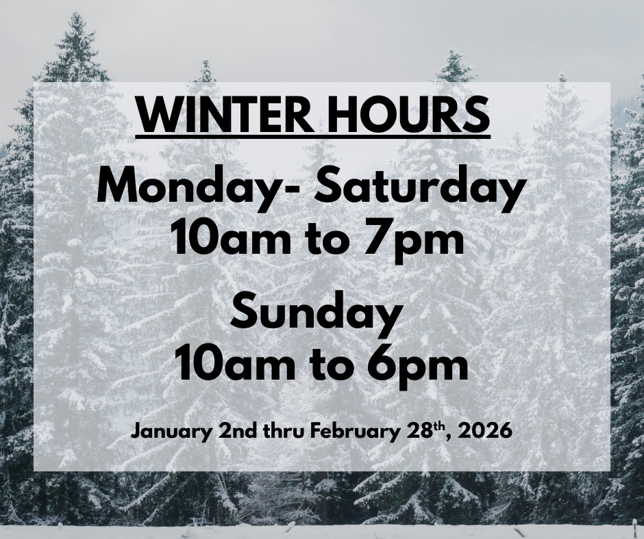 Winter hours sign with snowy trees background, indicating the seasonal hours of operation for a business, open Monday to Saturday from 10am to 7pm, Sunday from 10am to 6pm, from January 2nd to February 28th, 2026.