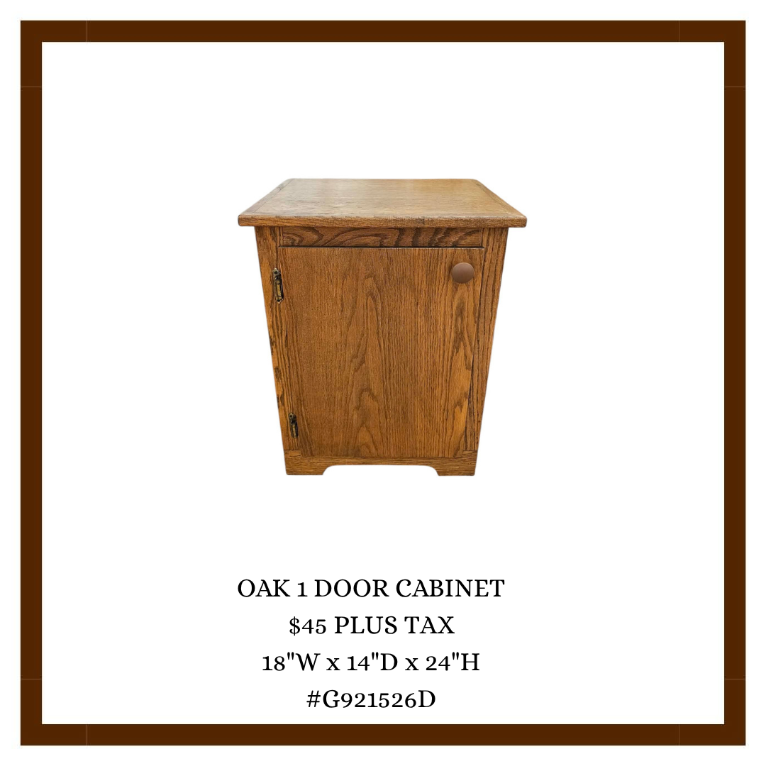 A wooden oak one-door cabinet with a round knob and a zipper handle, featured in a catalog with product details including dimensions, price, and item number.