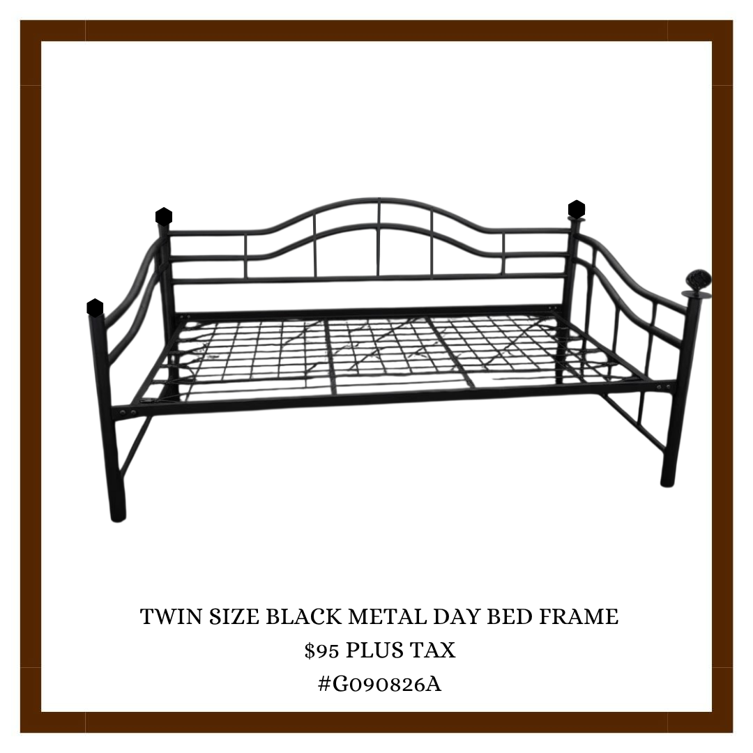 A black metal twin-size day bed frame with a grid base, curved headboard, and simple side rails, displayed against a white background.