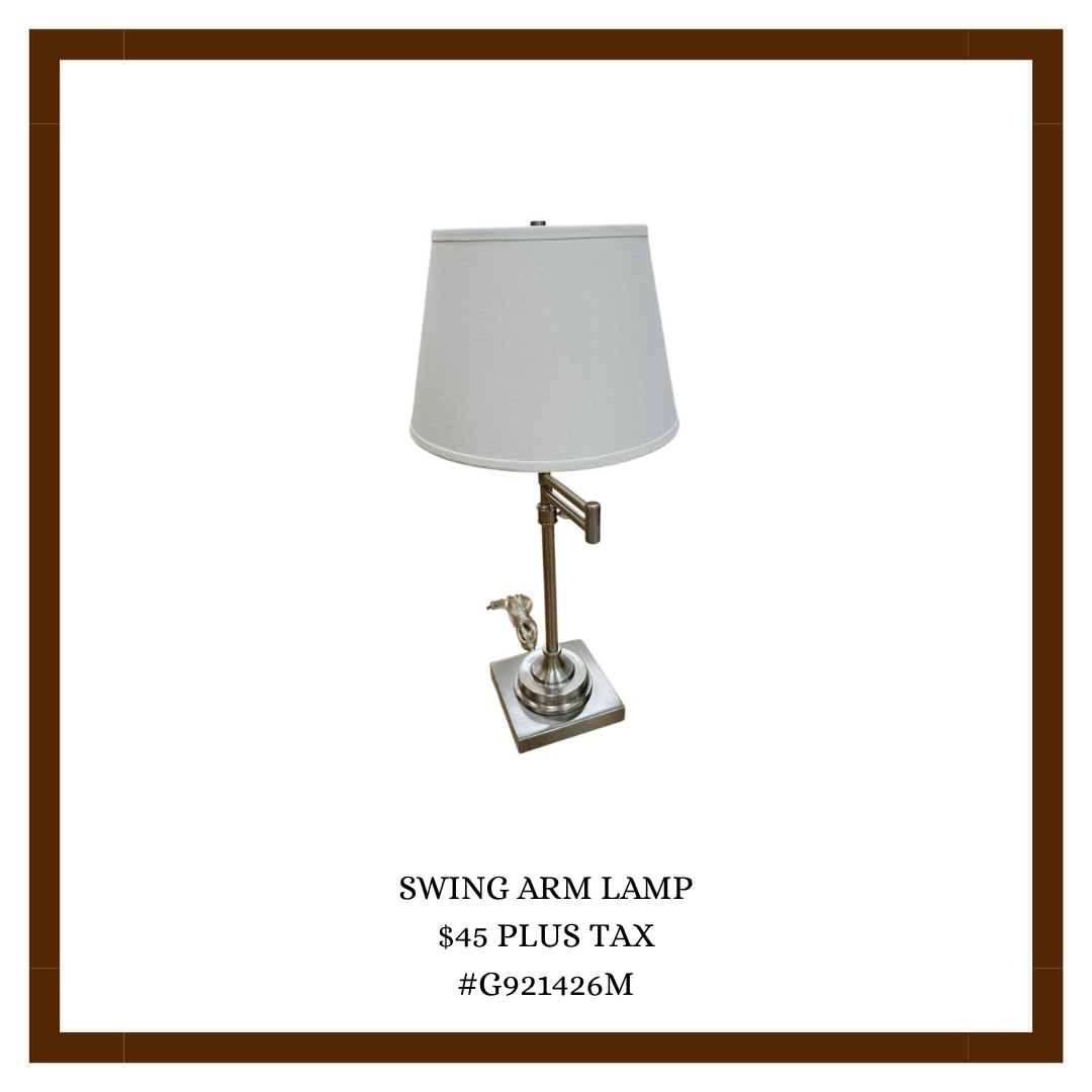 A swing arm lamp with a white shade and metallic base. The lamp is for sale at $45 plus tax, item number #G921426M.