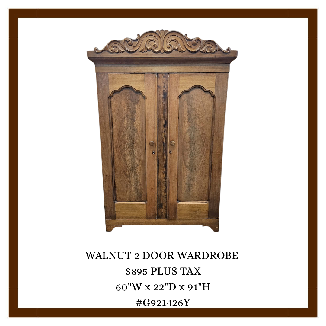 A wooden walnut two-door wardrobe with ornate carving on top, dimensions of 60 inches wide, 22 inches deep, and 91 inches high, priced at $895 plus tax.