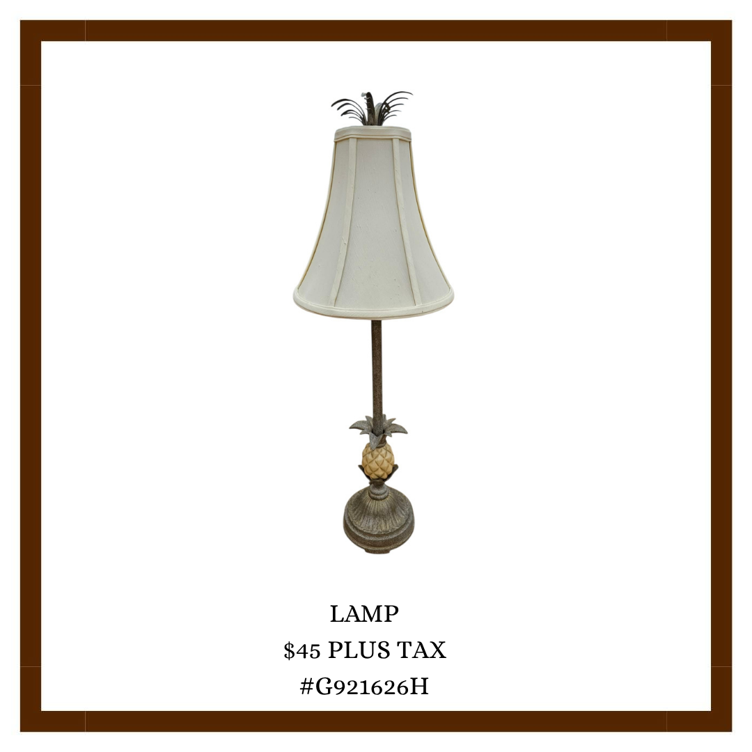 A lamp with a lampshade that resembles a pineapple on the base, with the price of $45 plus tax, and a product code G921626H.