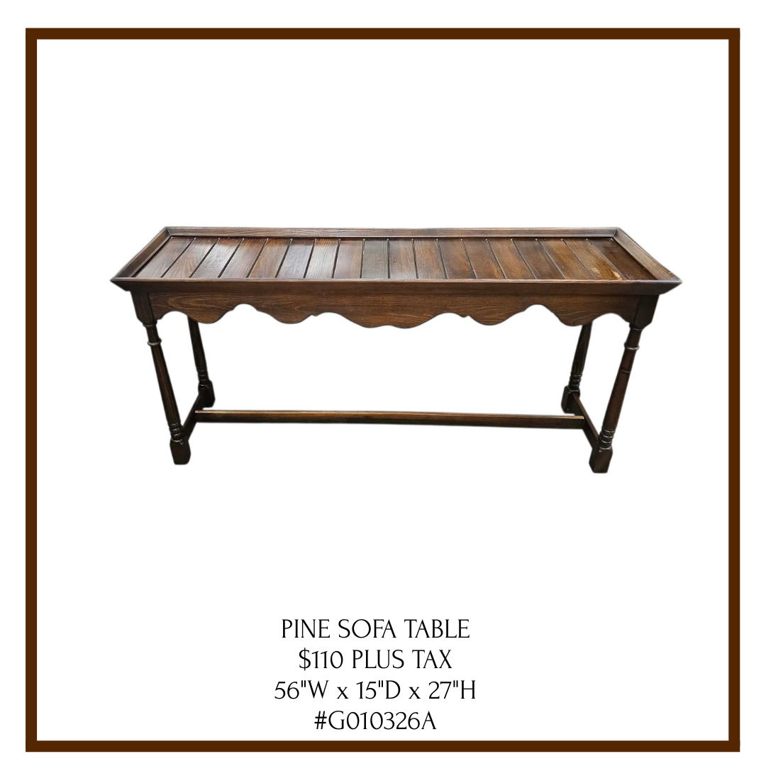 A wooden pine sofa table with a rectangular top, decorative scalloped apron, and four turned legs connected by a stretcher. Price and dimensions details at the bottom.
