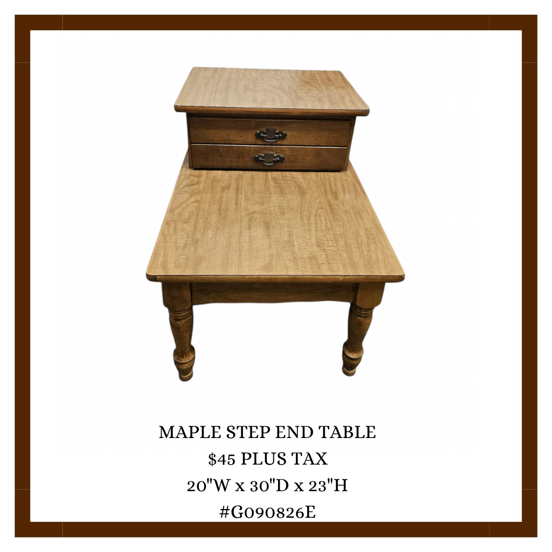 Image of a wooden maple step end table with two small drawers on top, detailed with metal handles, and turned legs, measuring 20 inches wide, 30 inches deep, and 23 inches high.