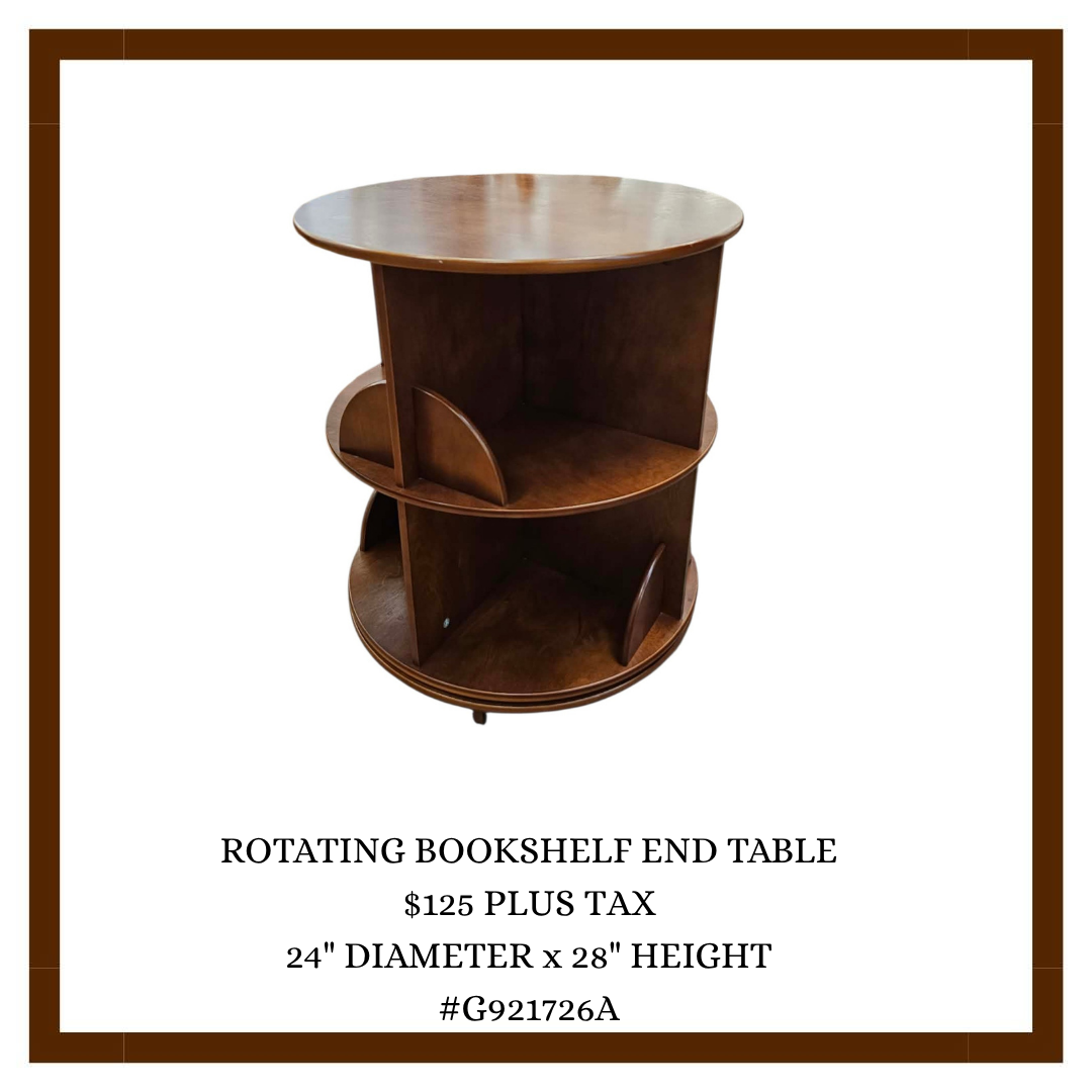 A wooden rotating bookshelf end table with three shelves and a brown finish.