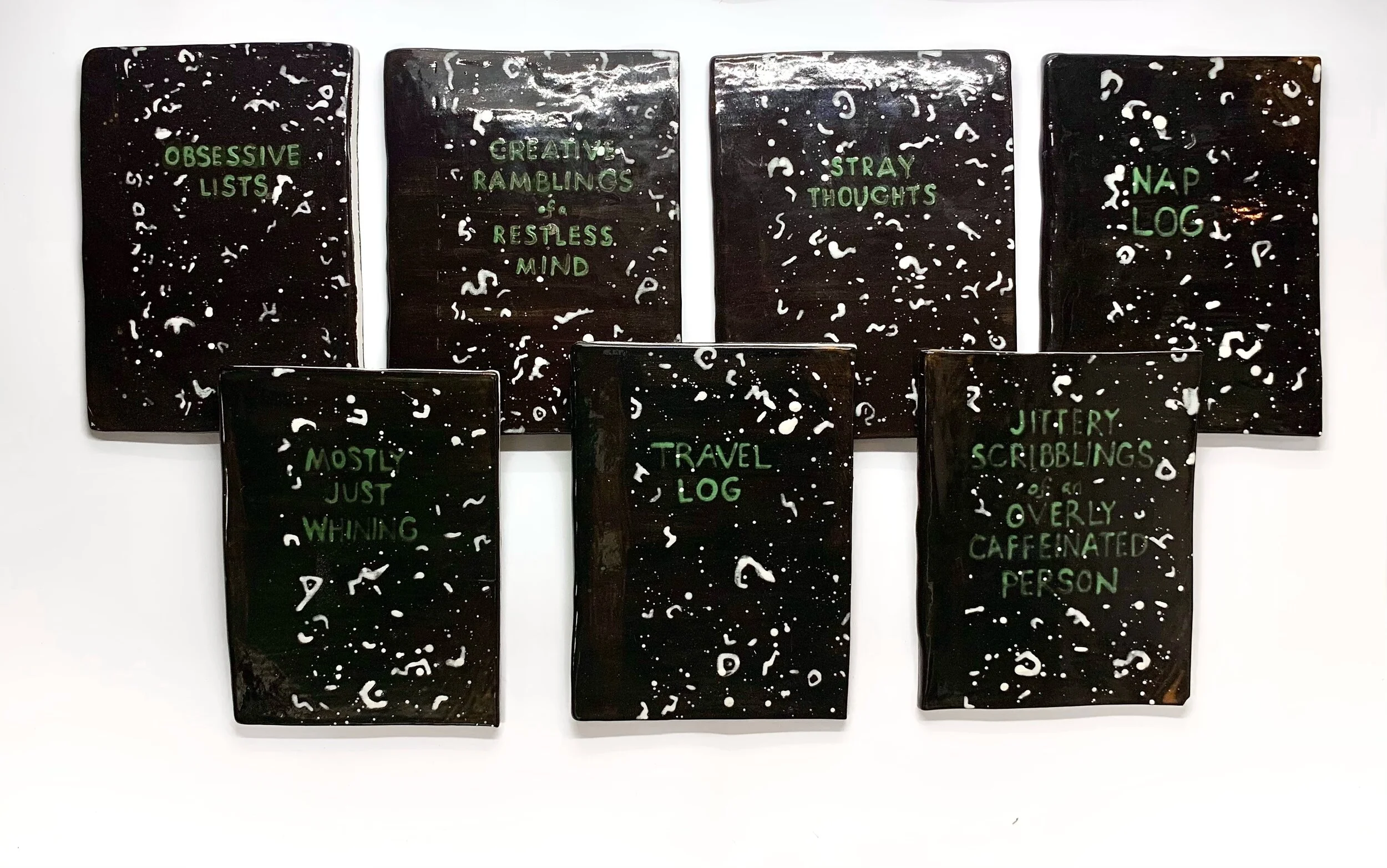 My Journals. 2021. Ceramic. Each ceramic: 5 in x 7 in (Dimensions variable)