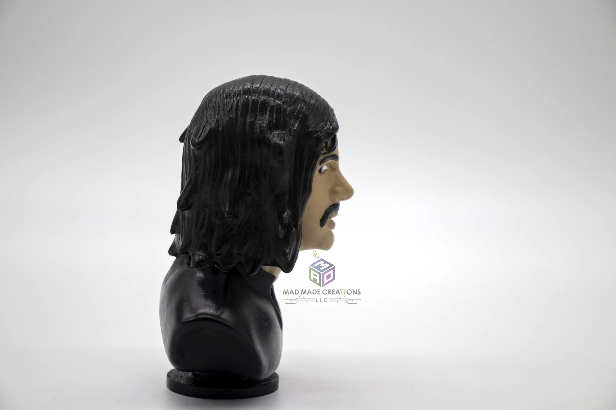 Side profile of a hand-painted custom 3D printed classic rock musician-inspired character bust by MAD Made Creations