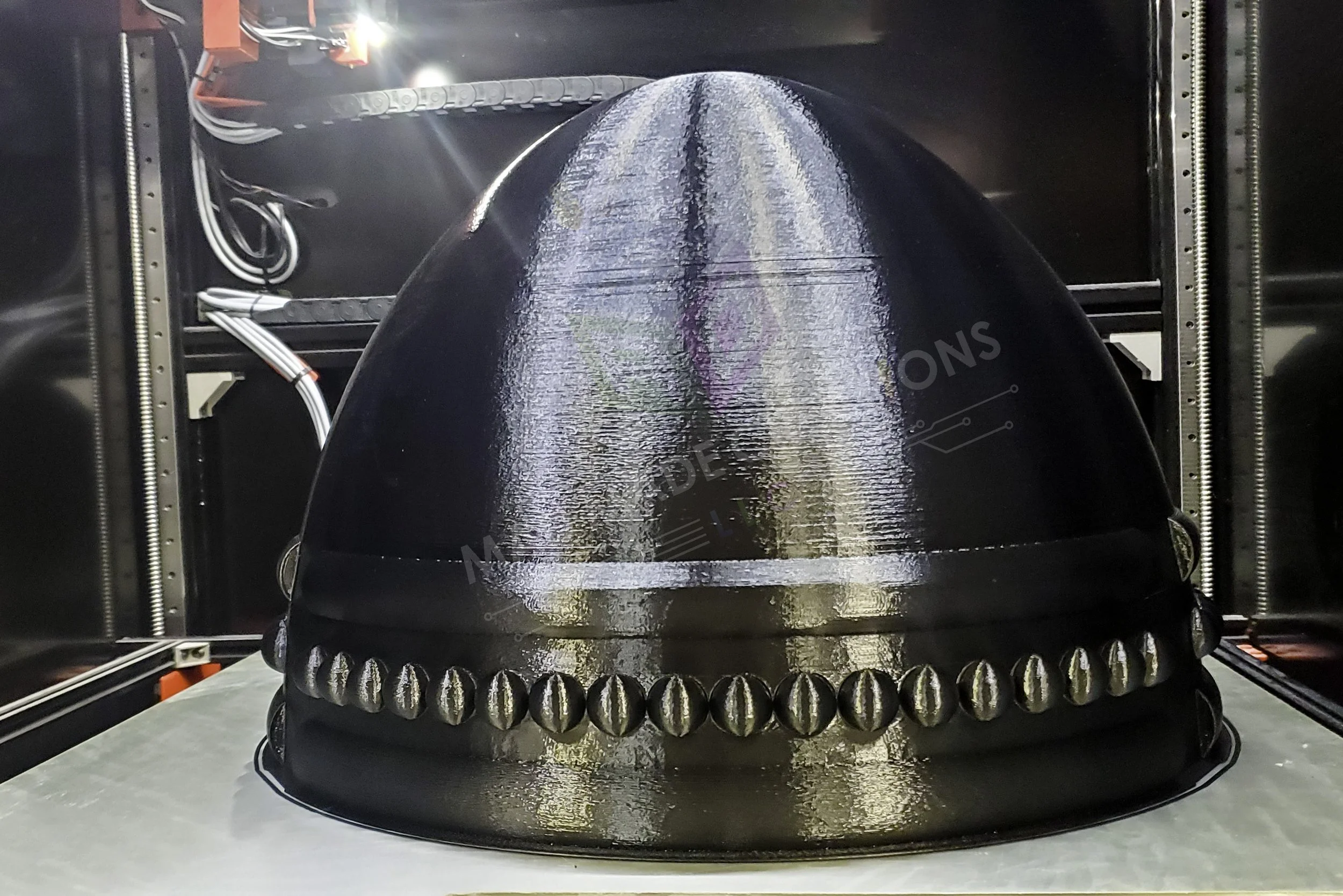 Custom black ABS brazier bowl prop print in progress on an industrial 3D printer by MAD Made Creations.