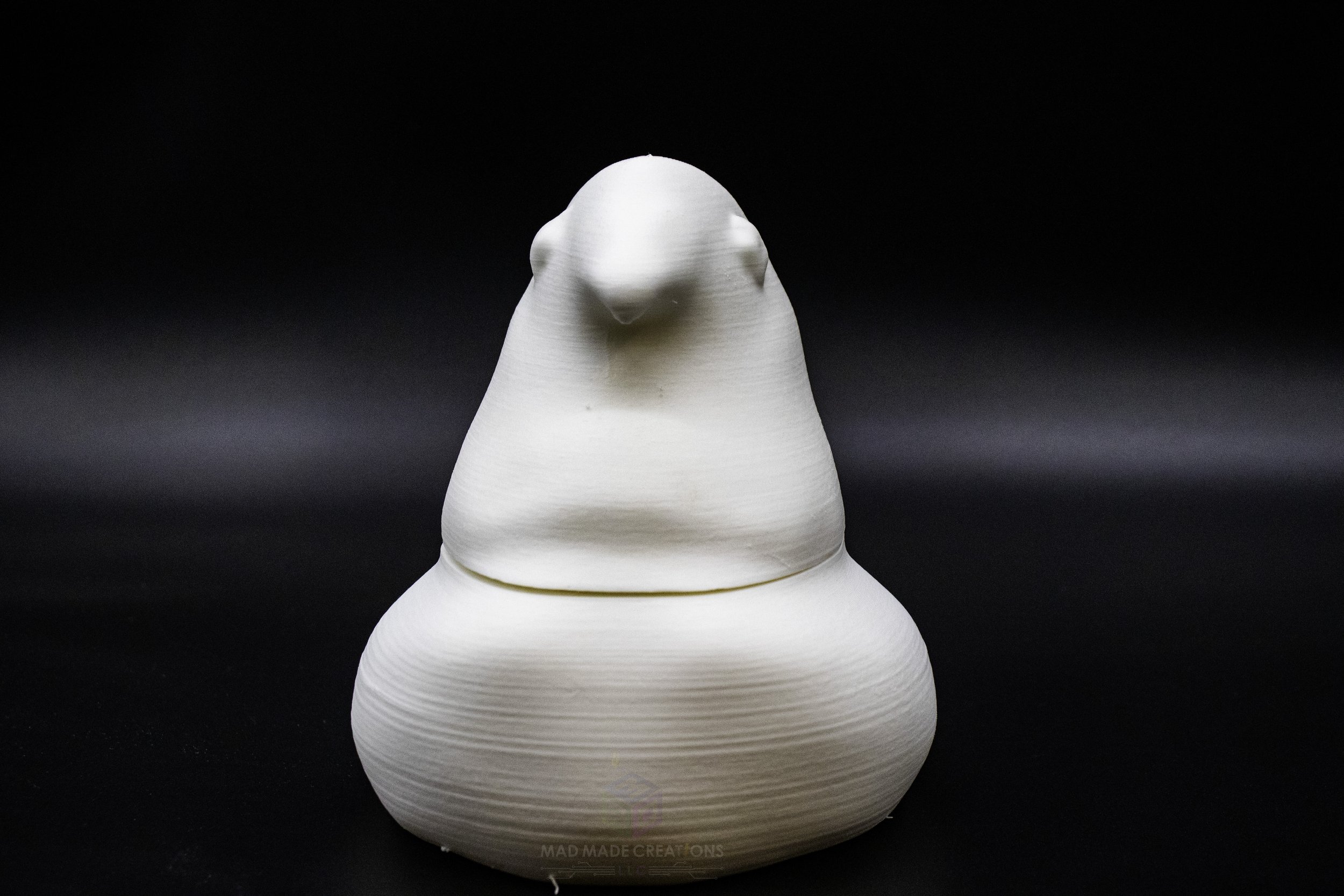 Front view of unpainted 3D printed Easter chick candy dish in white, perfect for DIY decorating and Easter crafting, created by MAD Made Creations