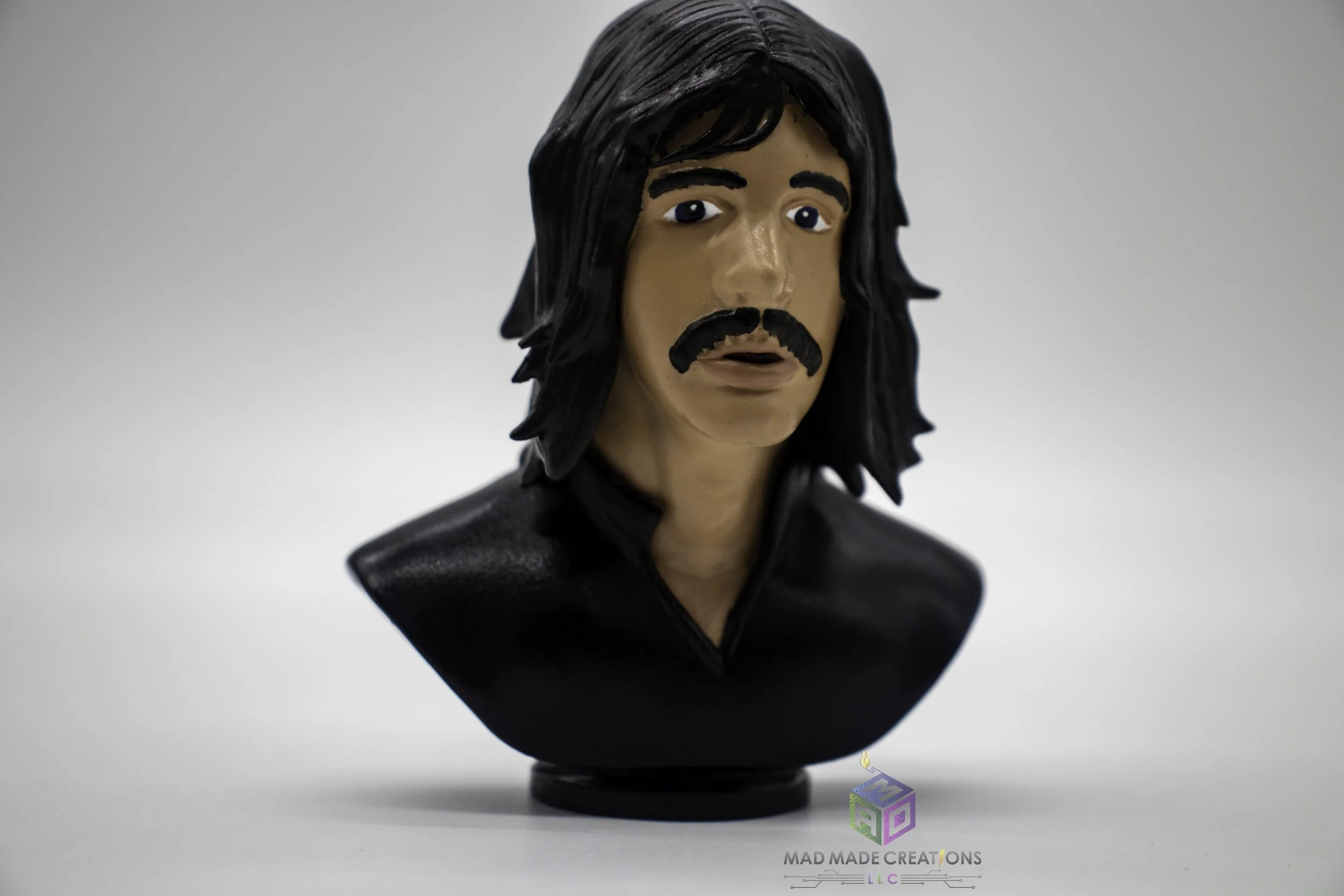 Close-up angled view of a hand-painted custom 3D printed classic rock musician-inspired character bust by MAD Made Creations