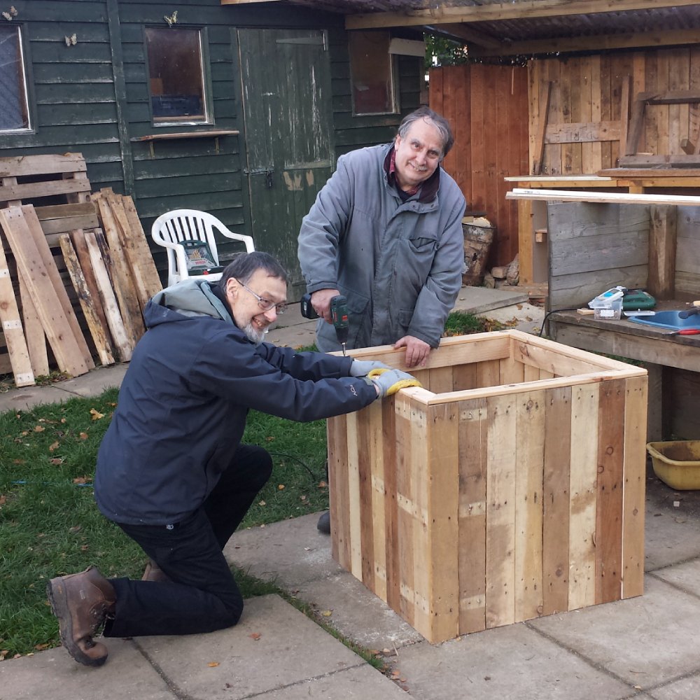Peter and David with Pallet planter 1 resize.jpg