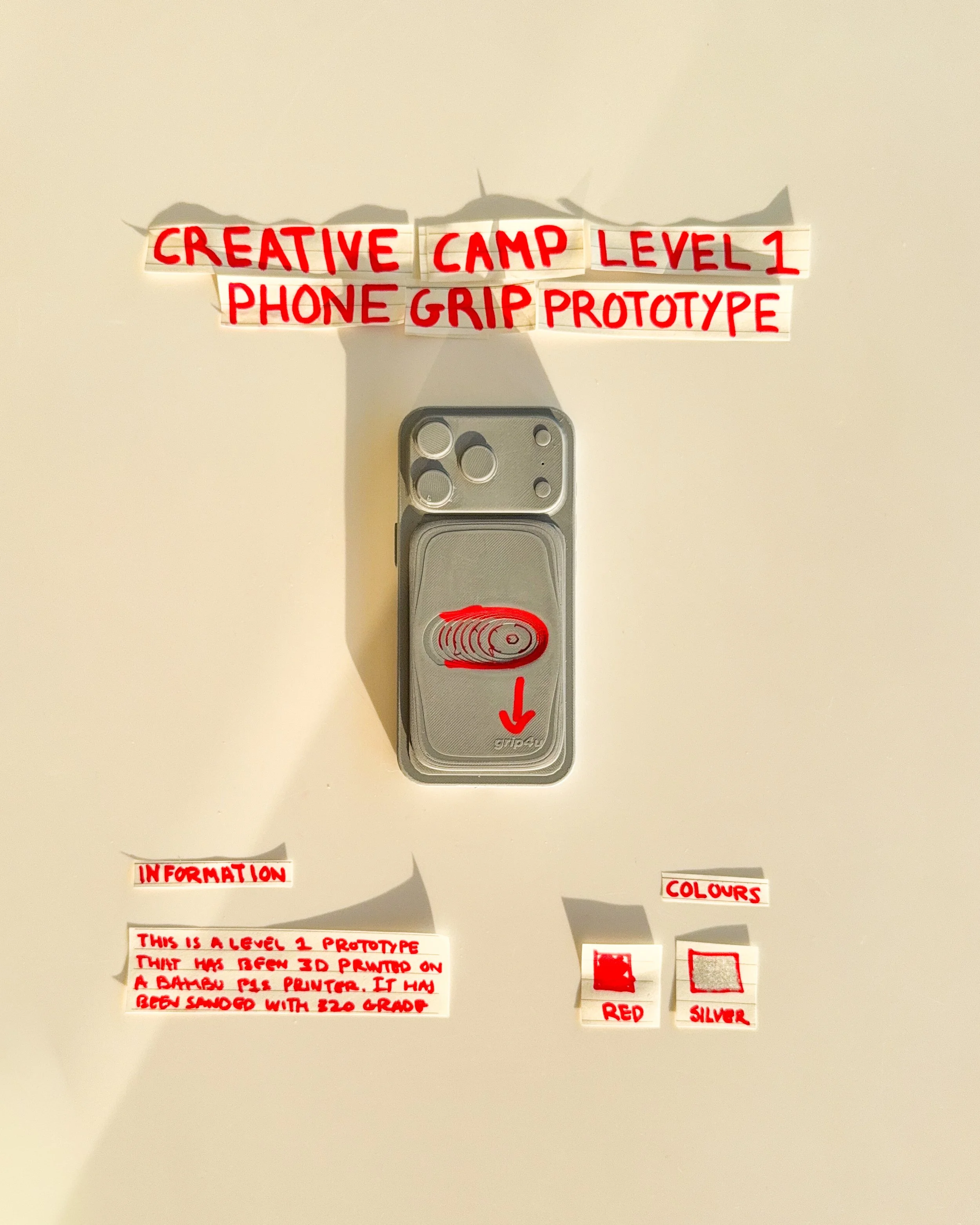 day 06: prototype 04. refine the original horizontal grip concept with a smaller finger opening, simplified lettering and a more compact arrangement of functional and graphic elements.