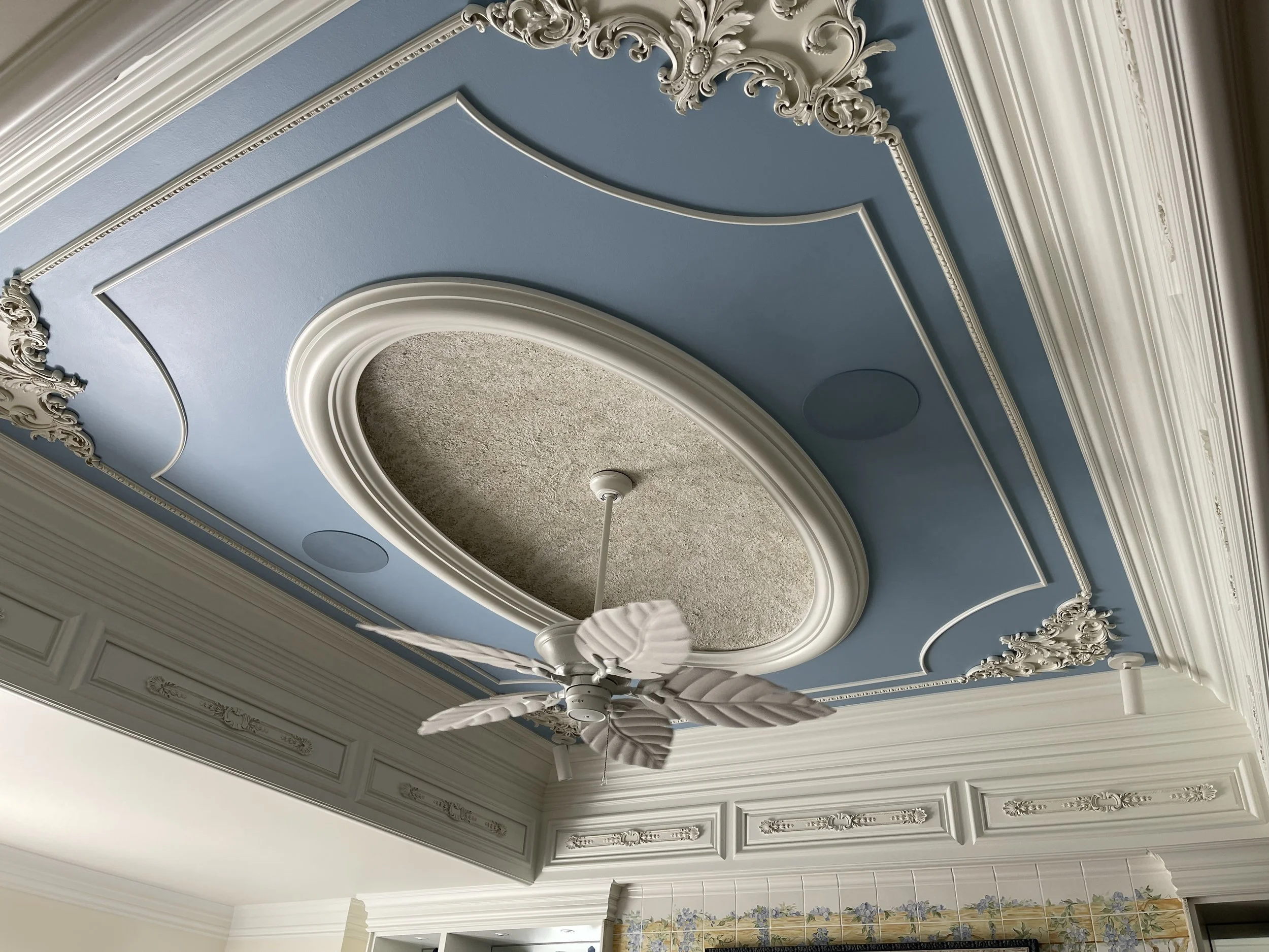 Glass beads and glitter ceiling dome in primary bedroom.
