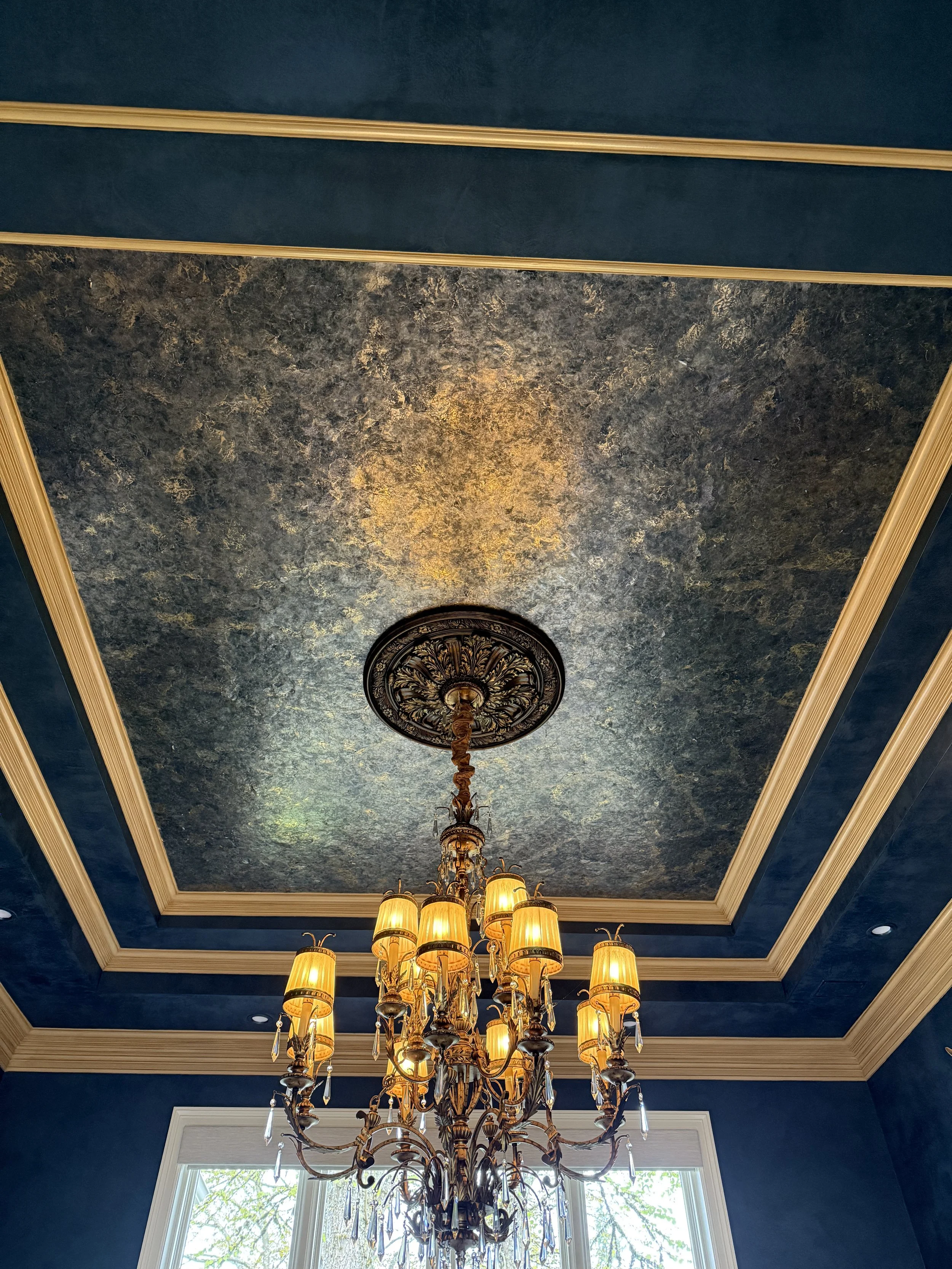 Mica Ceiling completed. The soft reflection of the chandelier warms the whole room.