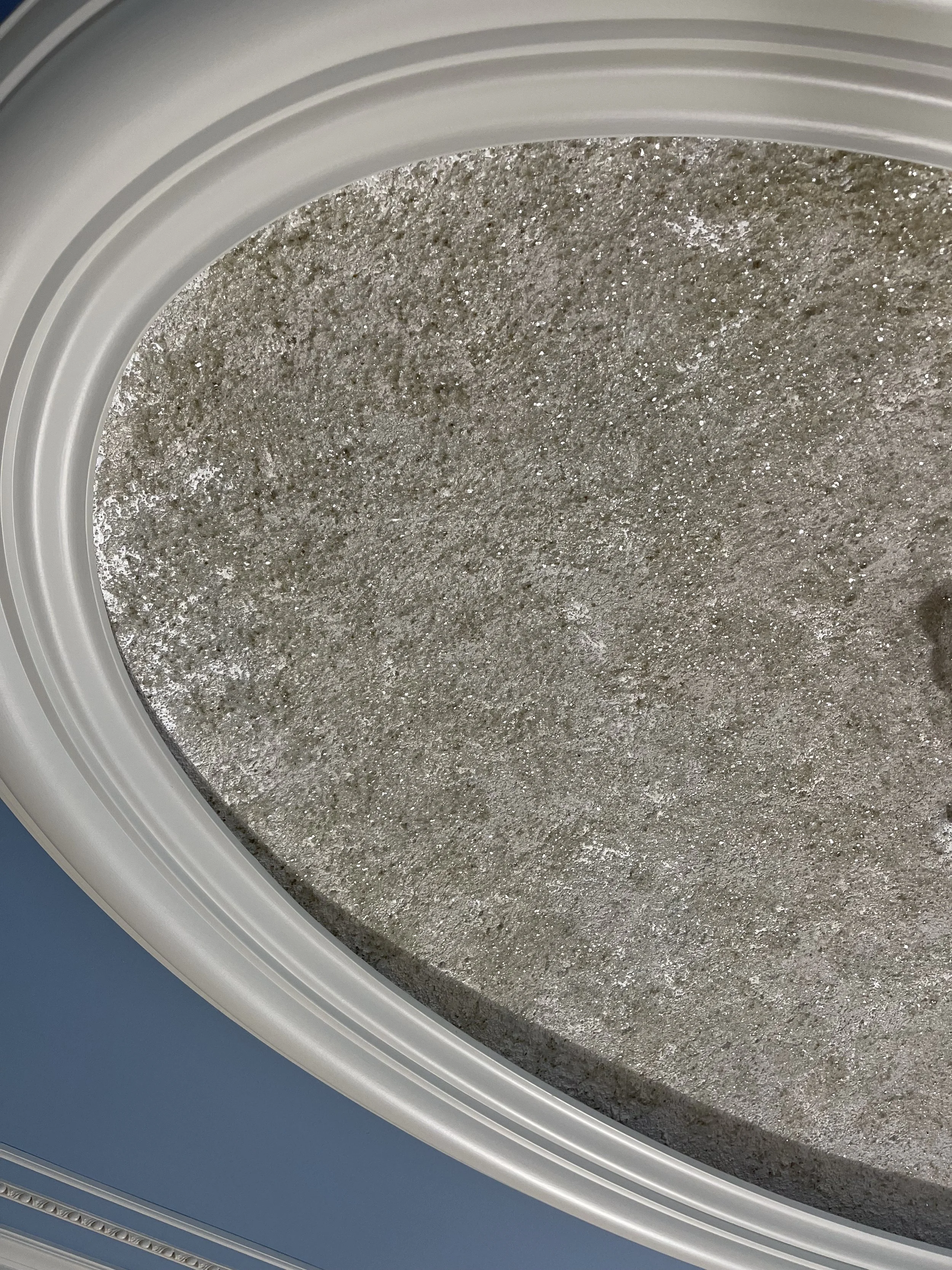 Close up of glass bead and glitter dome.