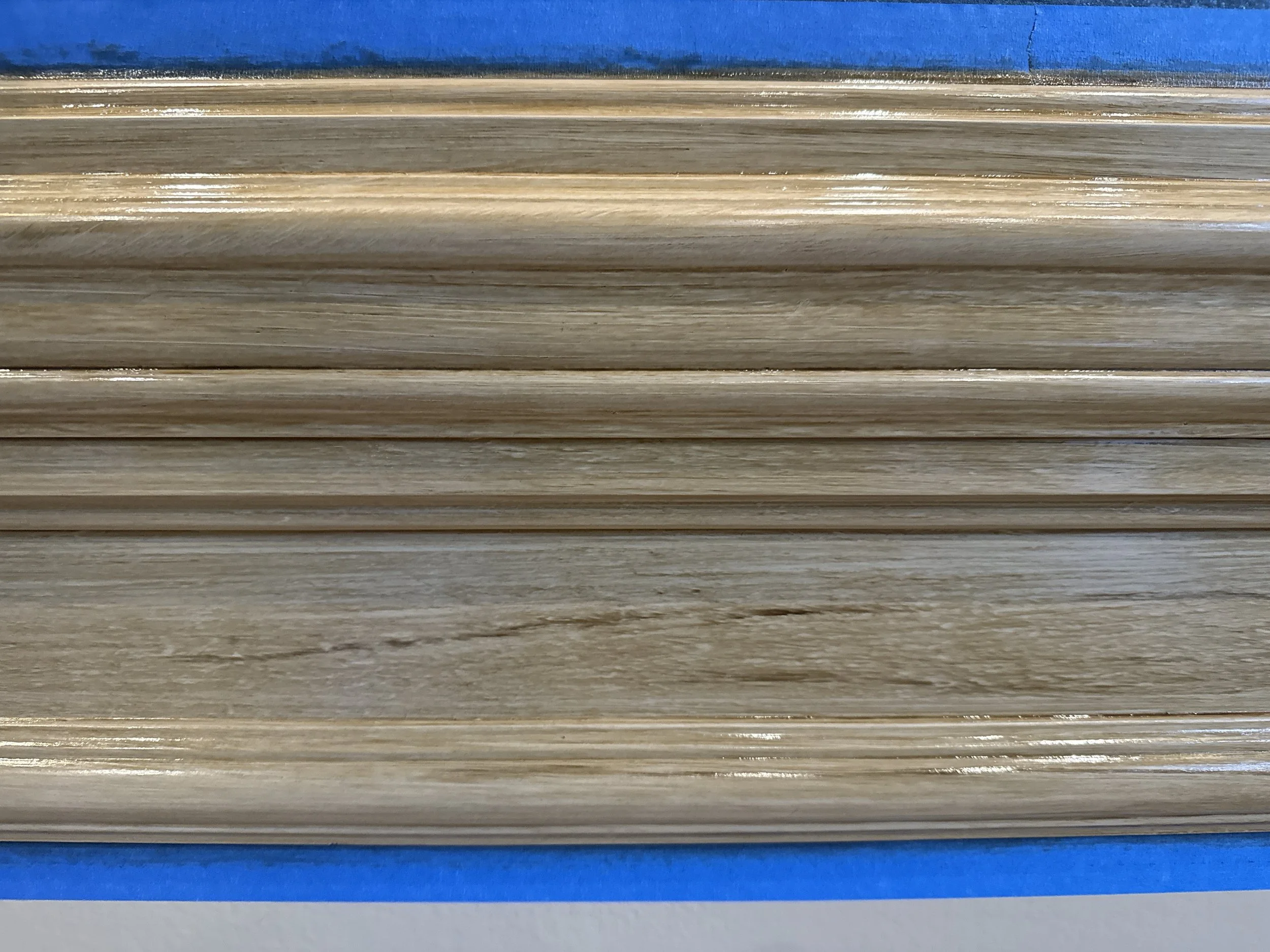 Woodwork close up after. It was not stripped, it was painted and glazed to look like natural wood.