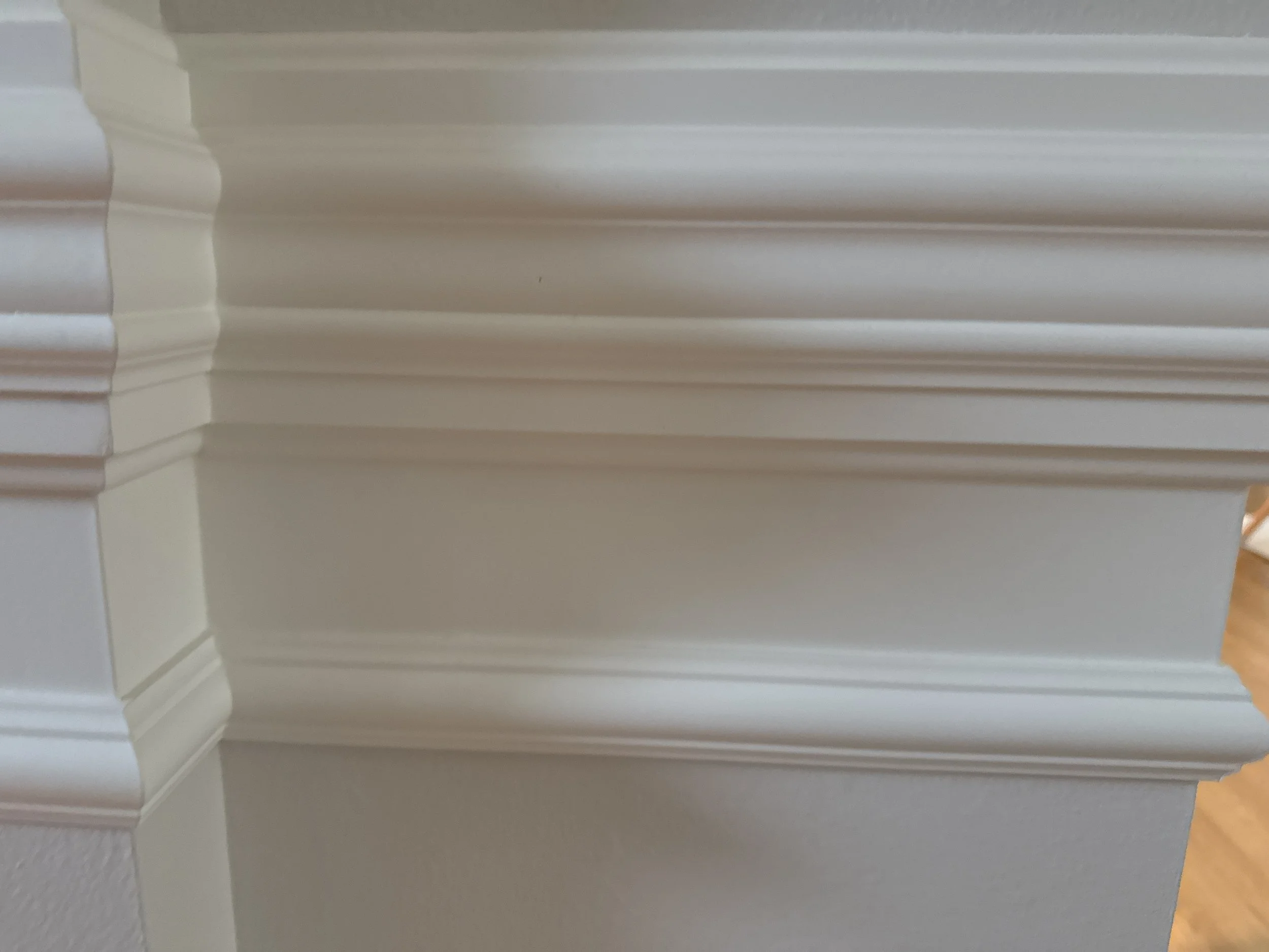 Close-up of woodwork before.