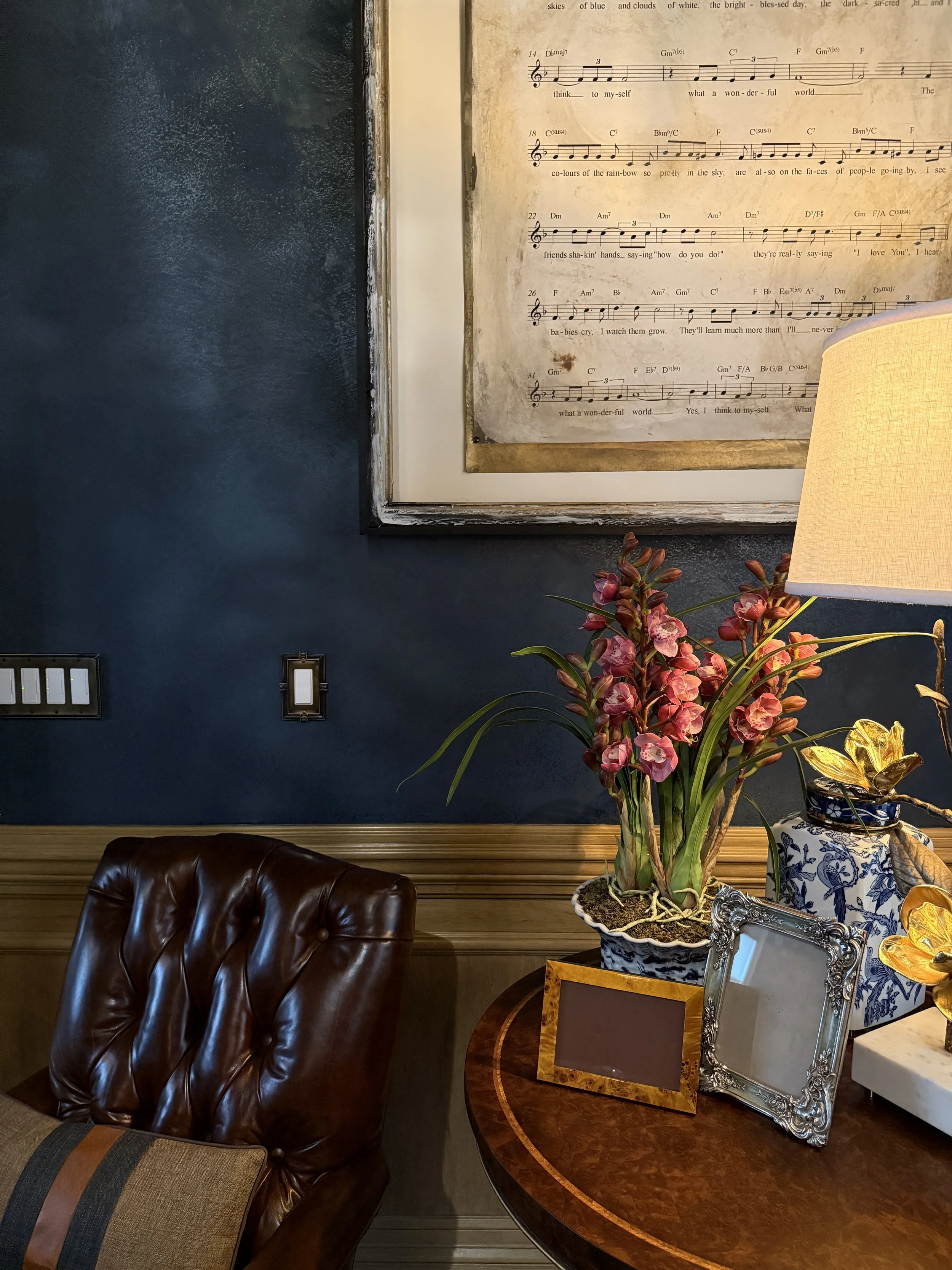 Cozy corner of living room. Metallic plaster and faux woodwork. 