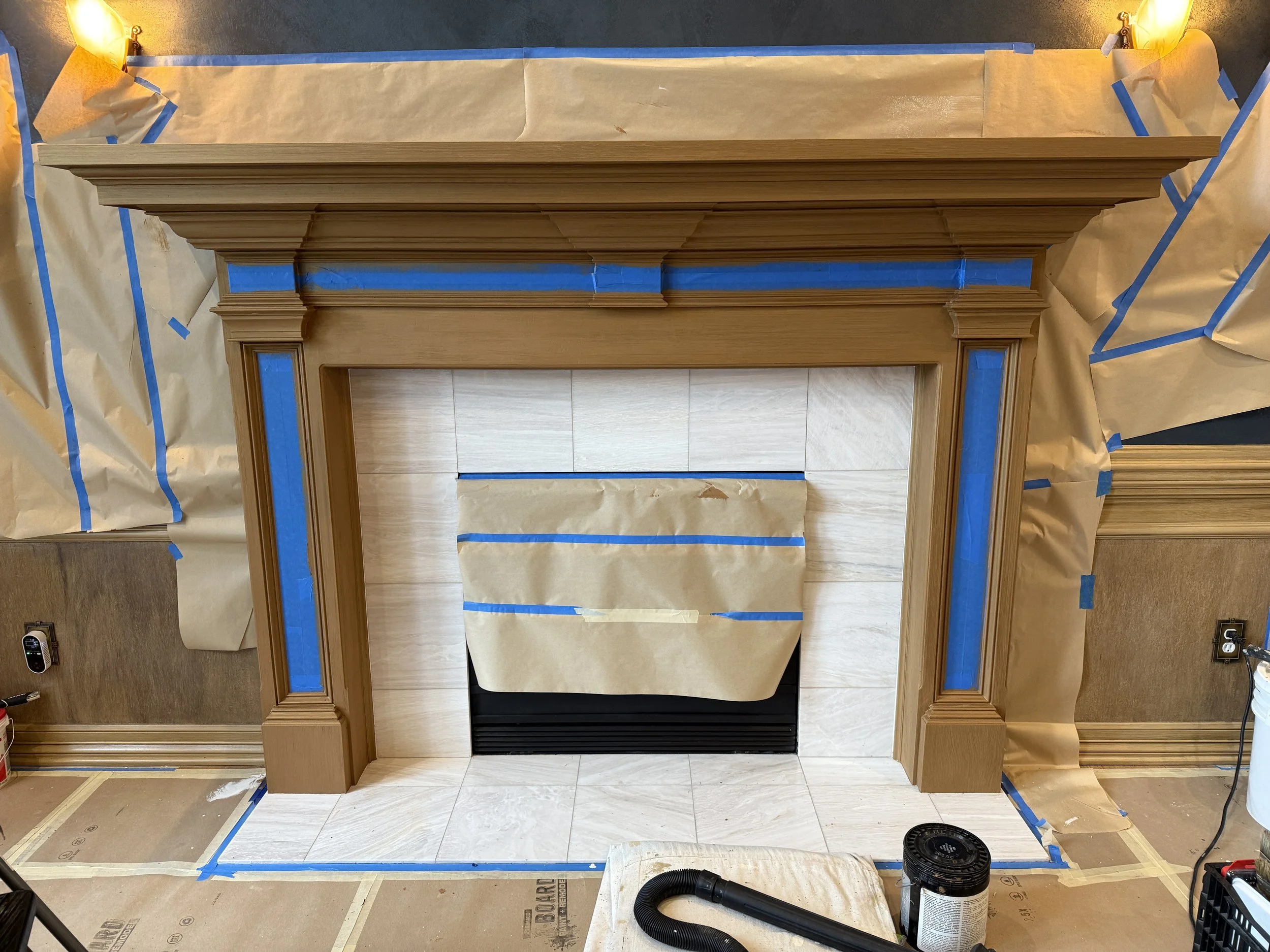 Adding warmth to the stark white mantle.