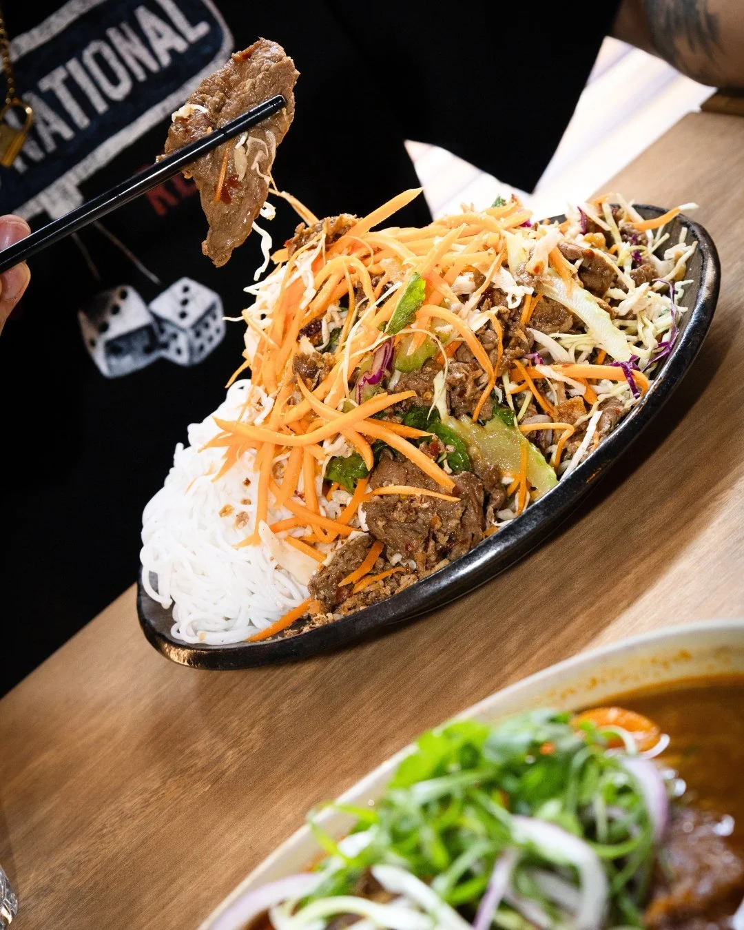 Vietnamese Salad with your choice of lemongrass beef, chicken or tofu. We know you like to keep your options open