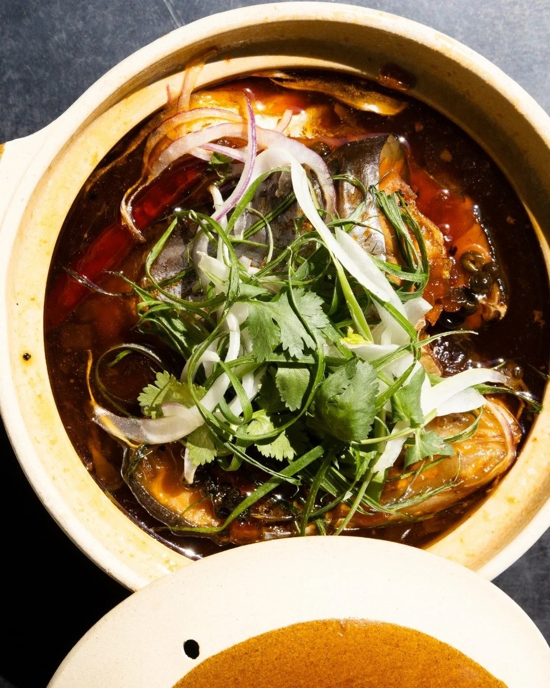 Bo Kho. You can't make it quickly at home, eat it here