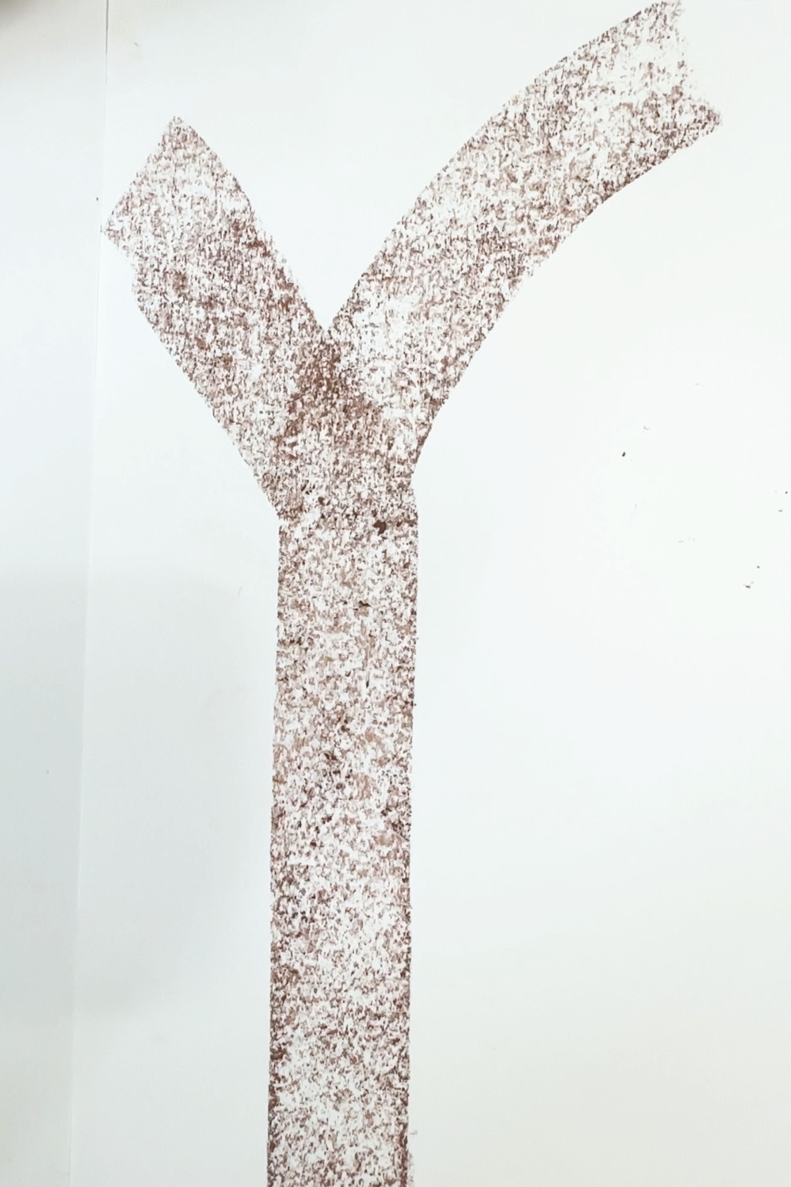 uppercase y drawn in brown pastel to represent basic impressionistic tree