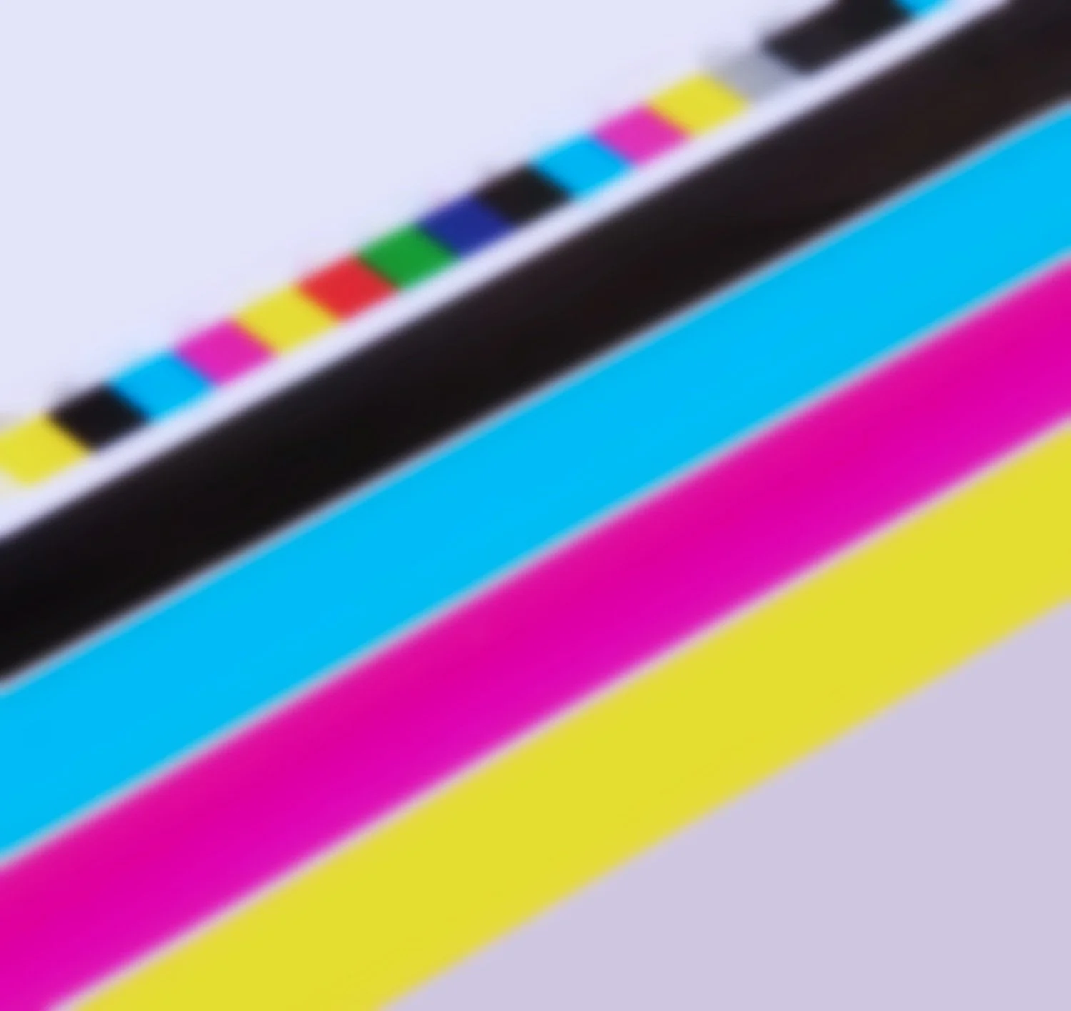 Color test strip with various color blocks including yellow, red, green, blue, cyan, magenta, black, and white.