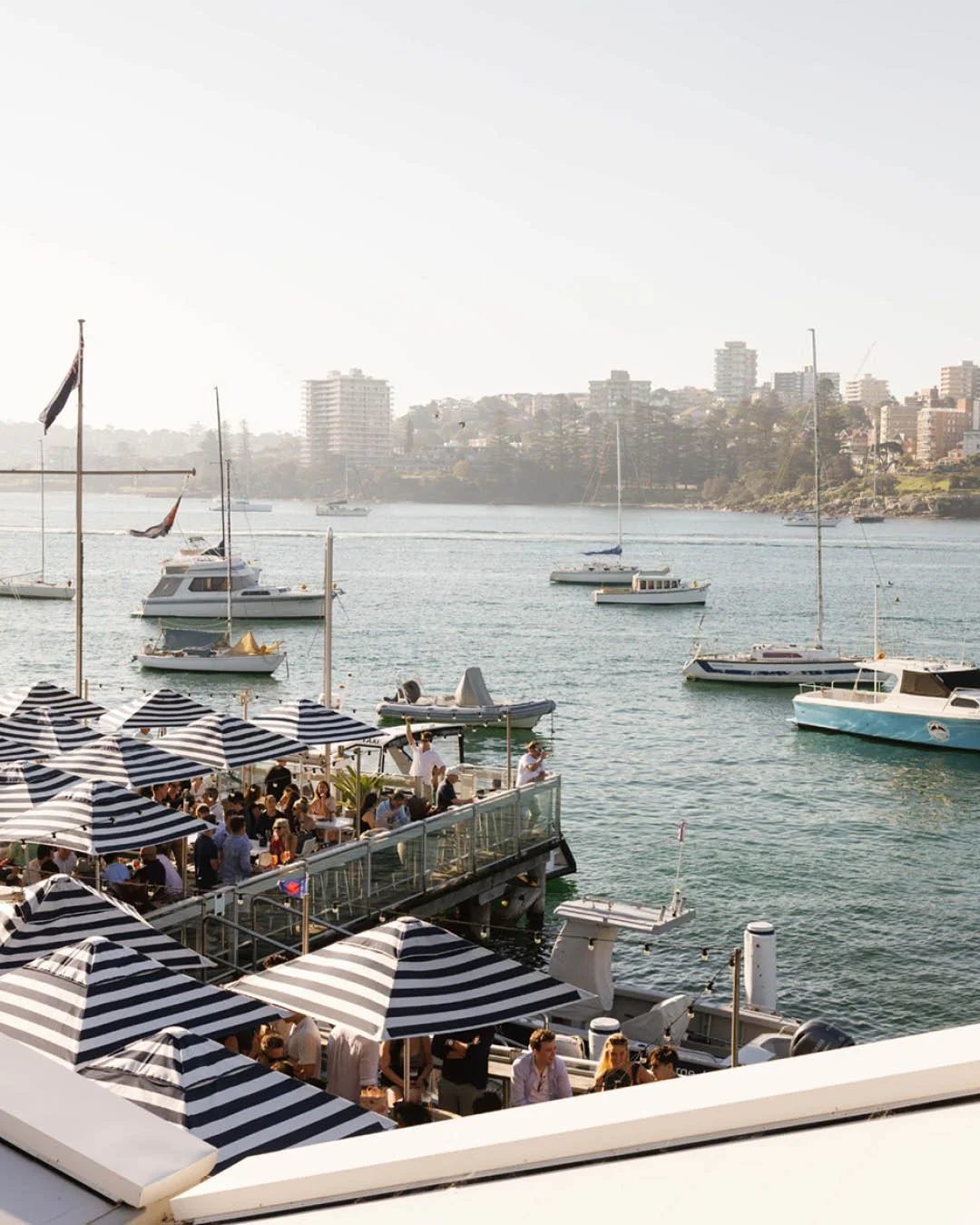 The most fabulous view in Manly &mdash; sparkling water, sunset skies, and a spritz in hand. Manly Skiff Club, you never disappoint

+++

#ManlyMagic #SkiffClubViews #GoldenHourGoals
