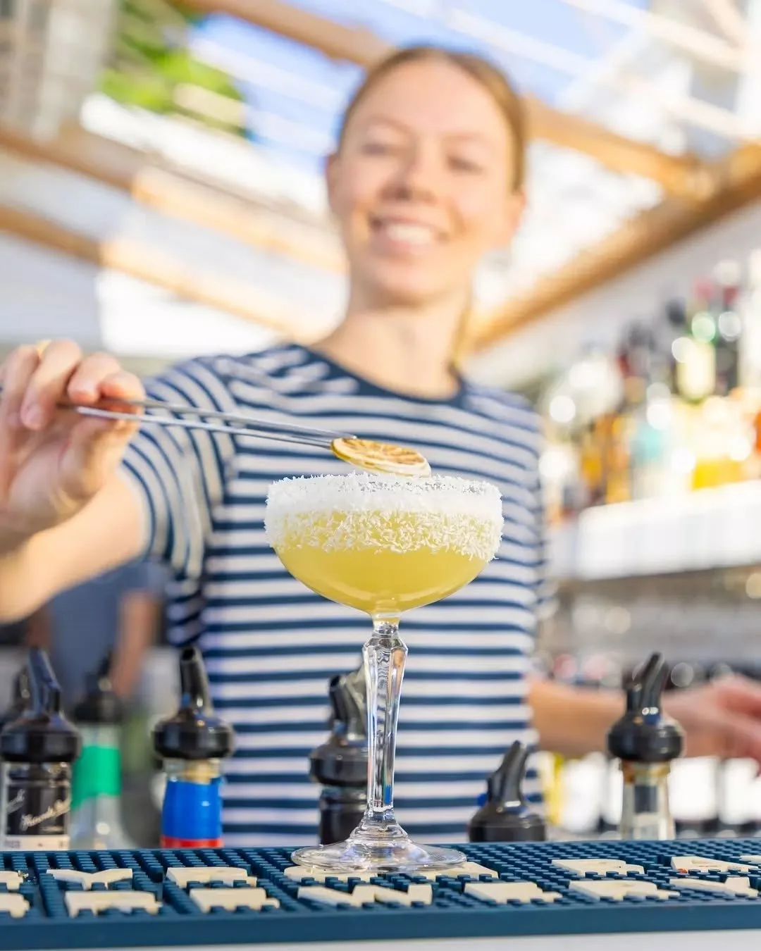 The finishing touch. Every cocktail crafted to order, garnished to perfection, and ready for the deck.