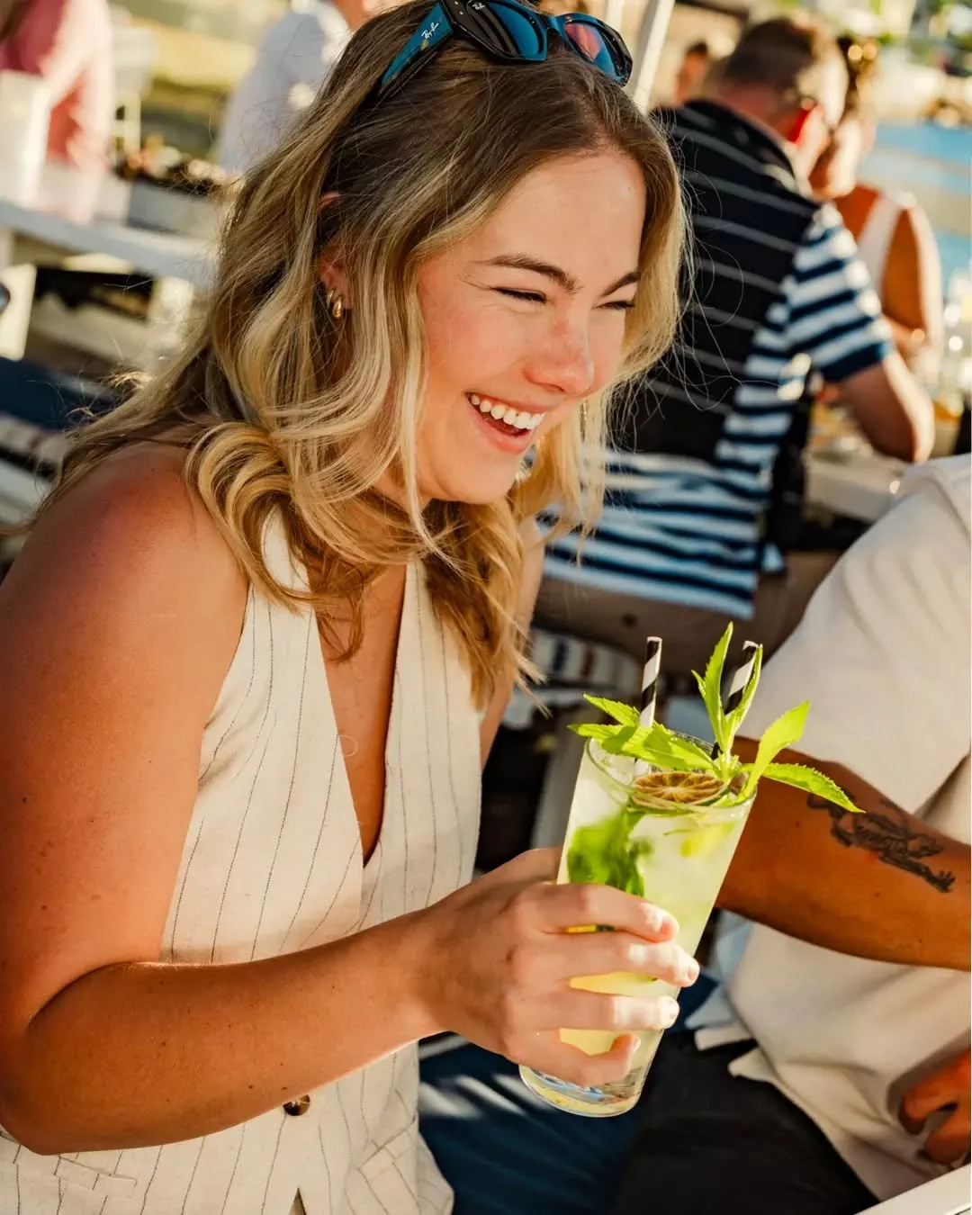 Fresh mint, lime, and rum muddled to perfection. Mojitos on the deck with harbour views&mdash;summer in a glass.