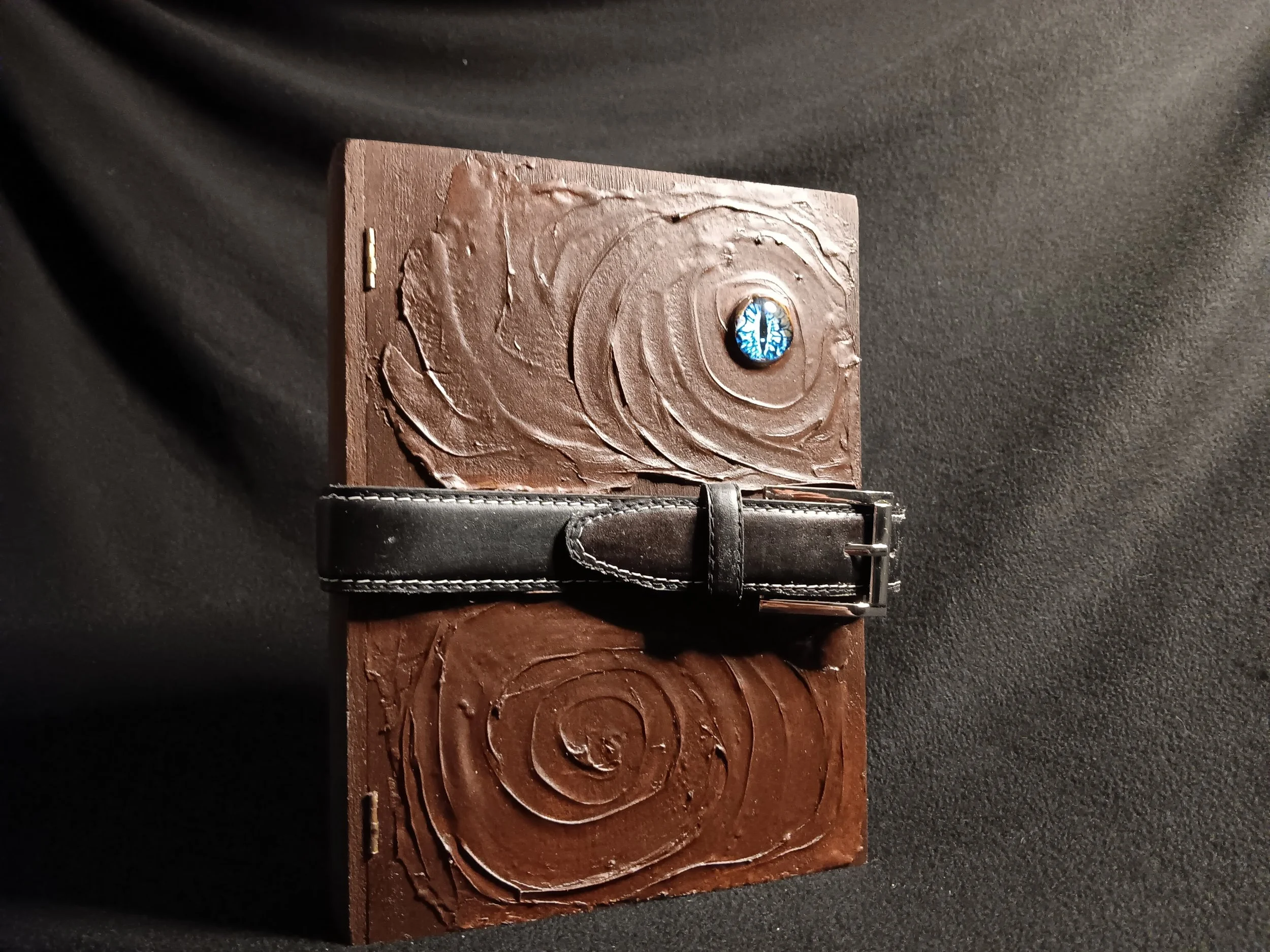 book mimic with belt