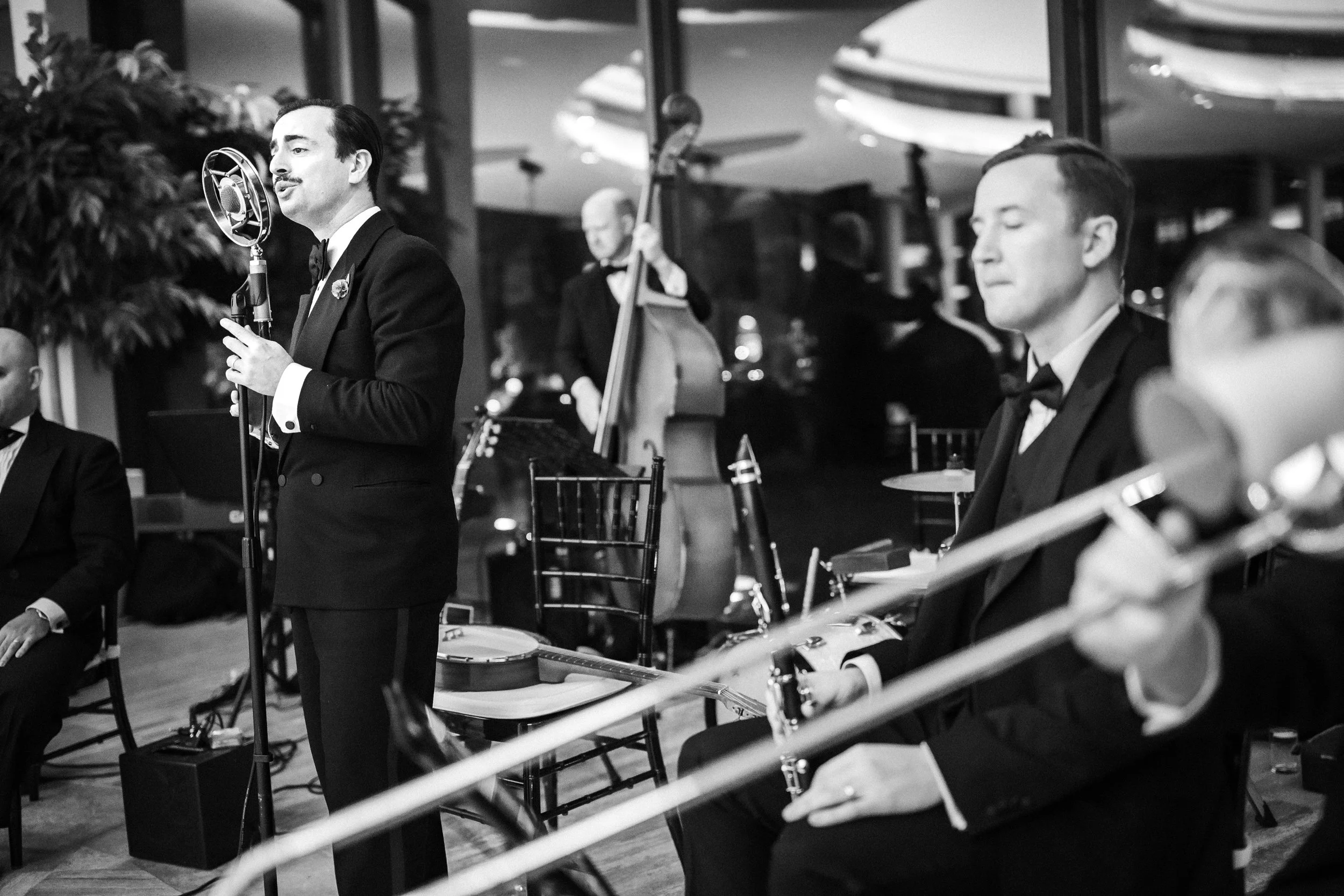 Charlie Roman Jazz Band performing with a larger jazz ensemble at a wedding reception at Jasna Polana in Princeton, New Jersey.