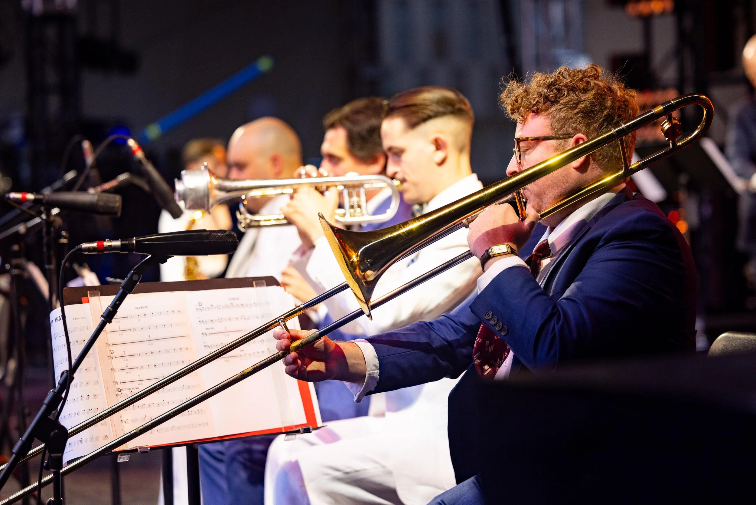 Horn section of Charlie Roman’s 10-piece jazz band performing at Lincoln Center in New York City
