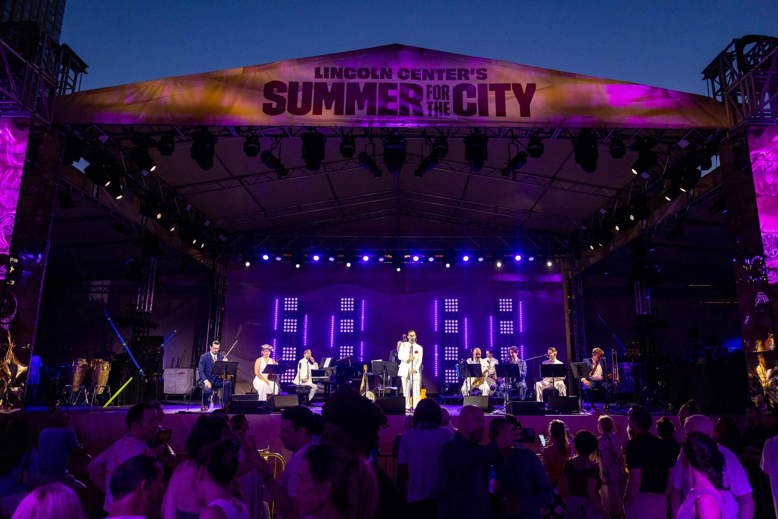 Charlie Roman leading a 10-piece jazz band at Lincoln Center's Summer for the City in New York City