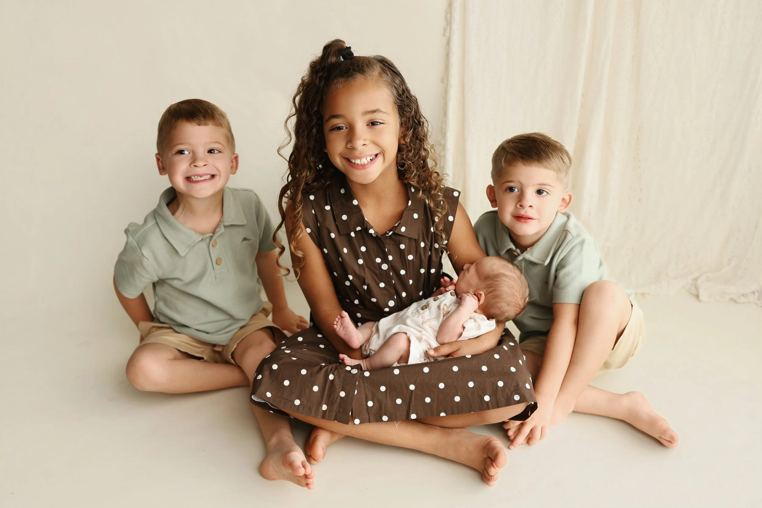 A Sweet Beginning: A Newborn Session with Three Big Siblings