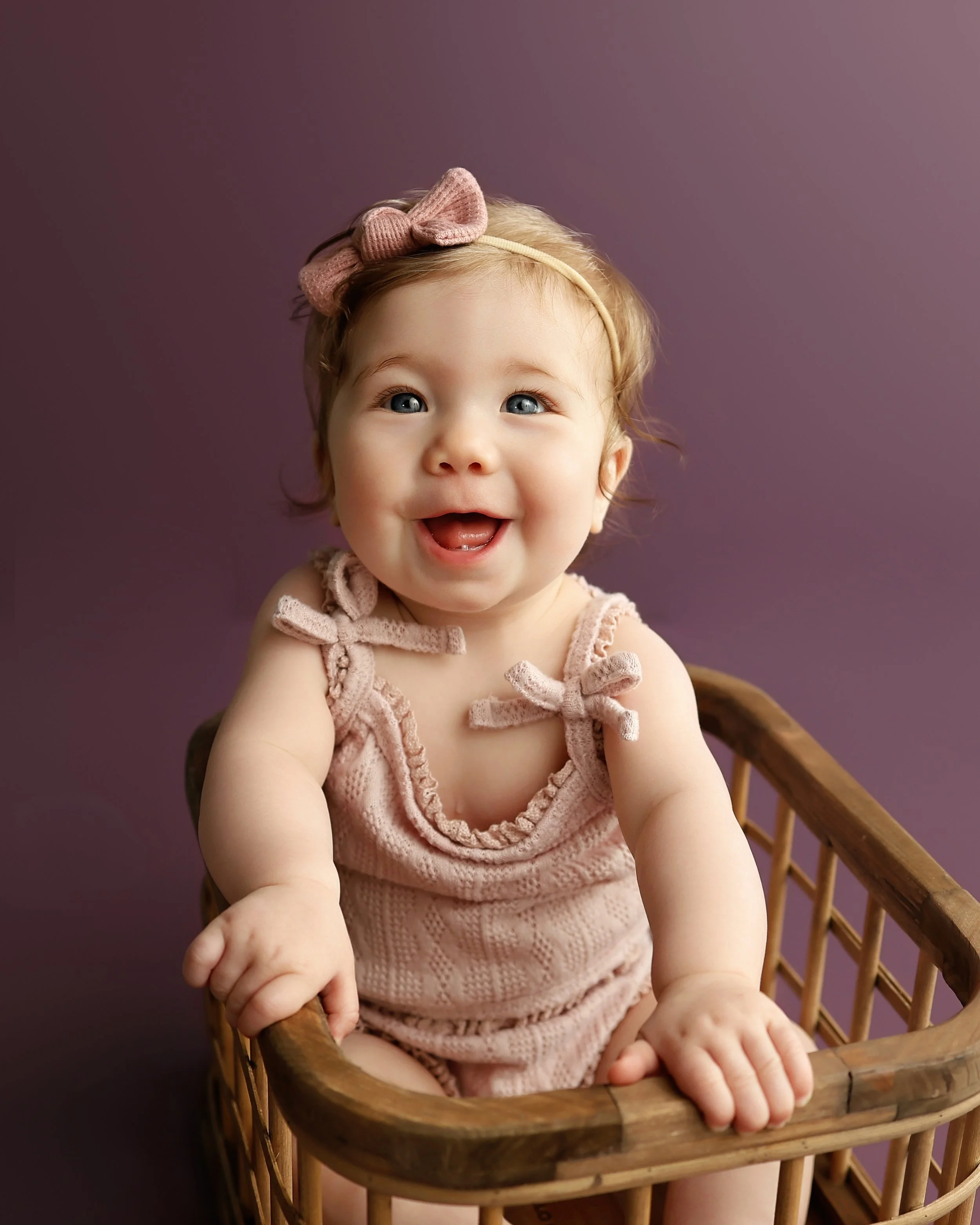baby-girl-milestone-photo-shoot-plum-background-southern-illinois.jpg