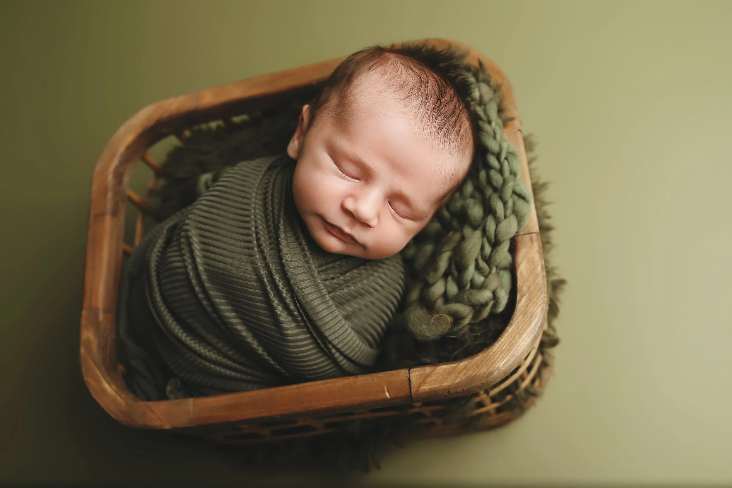newborn-photo-session-baby-in-green.jpg