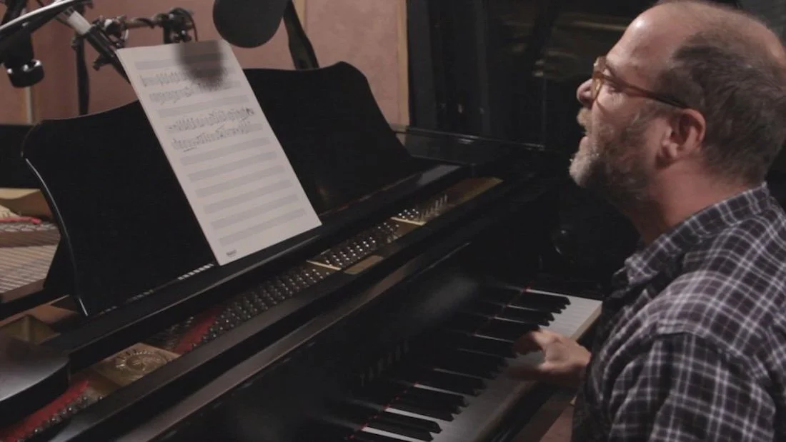 H. Jon Benjamin playing piano
