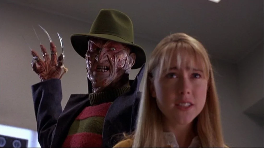 WES CRAVEN'S NEW NIGHTMARE (1994) Robert Englund and Tracy Middendorf