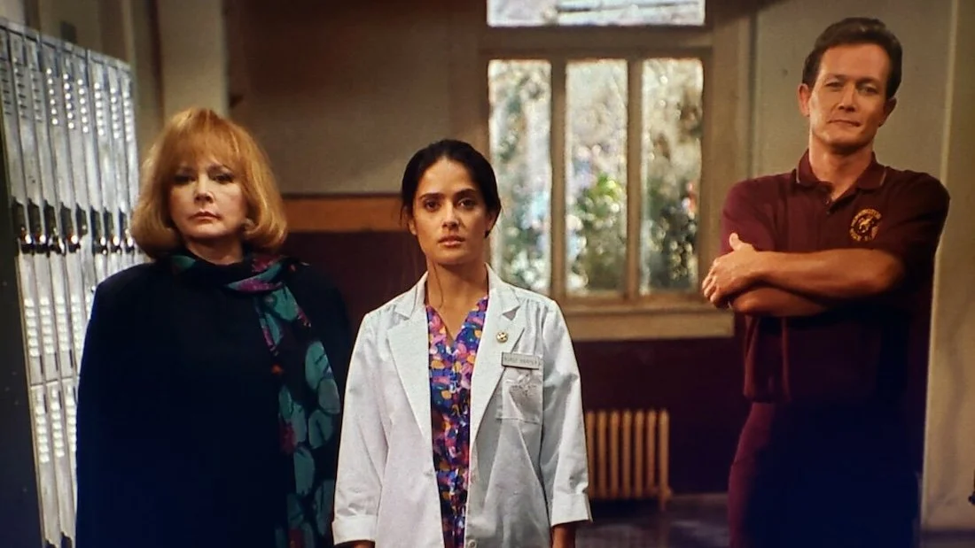 THE FACULTY (1998) Piper Laurie, Salma Hayek, and Robert Patrick