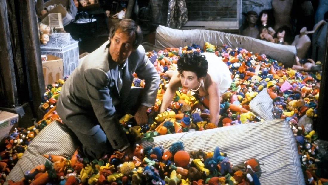 NOTHING BUT TROUBLE (1991) Chevy Chase and Demi Moore