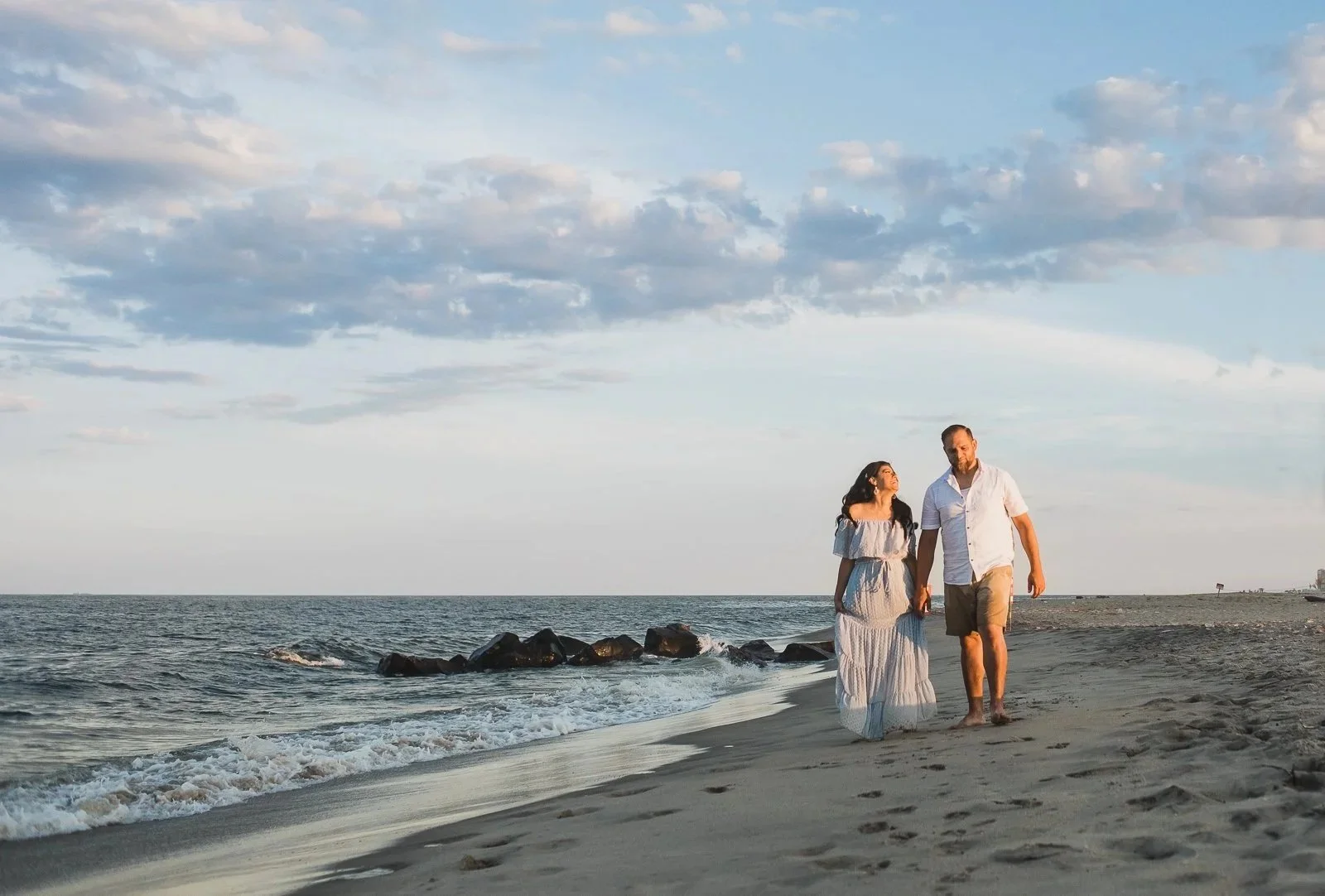 couple walking along the beach