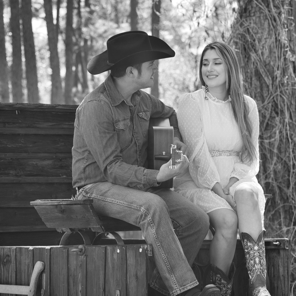Cowboy singing to a young woman