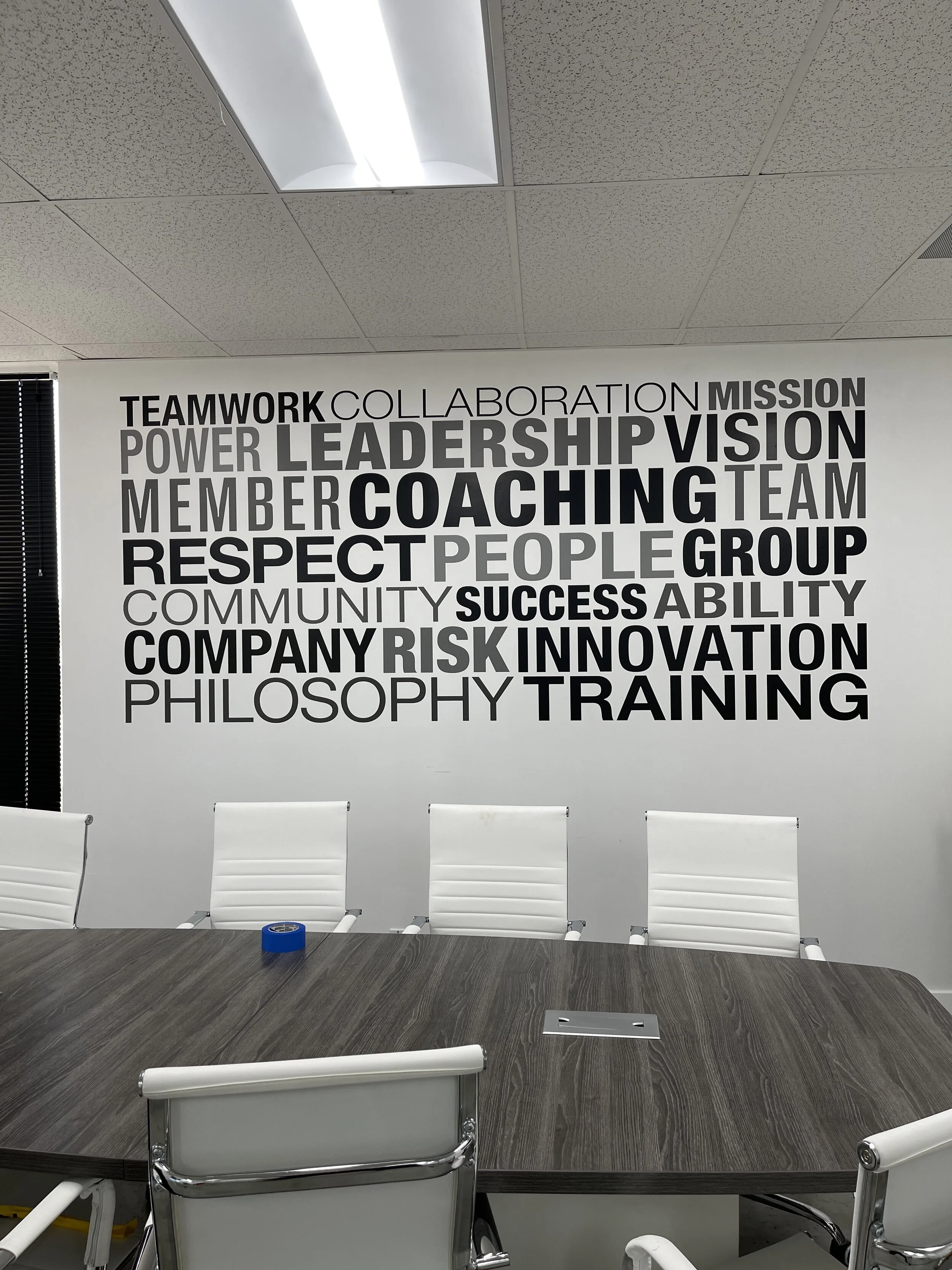 Computer cut vinyl wall graphic in an office