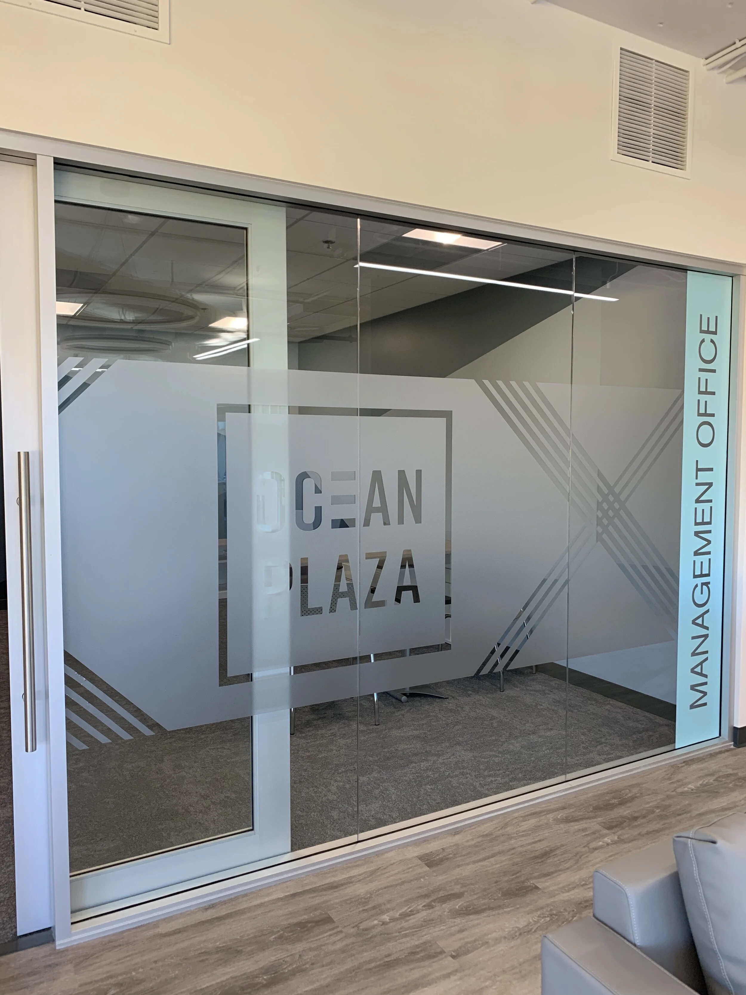 Computer cut etch window graphic in an office